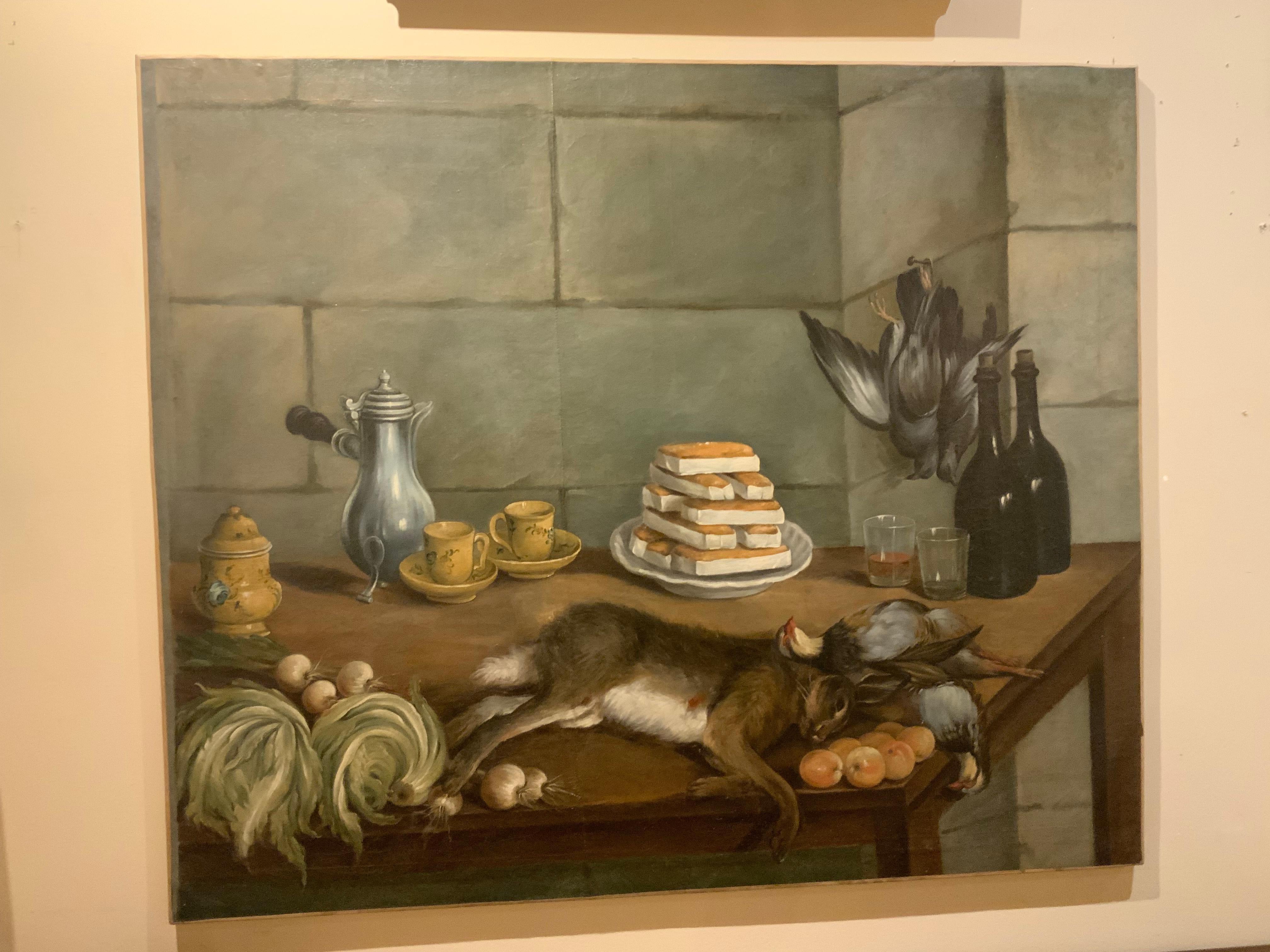 This large still life painting of a French kitchen depicting 
Items and animals ready for preparing a meal. Well
Painted in lovely muted tones of gray and green.