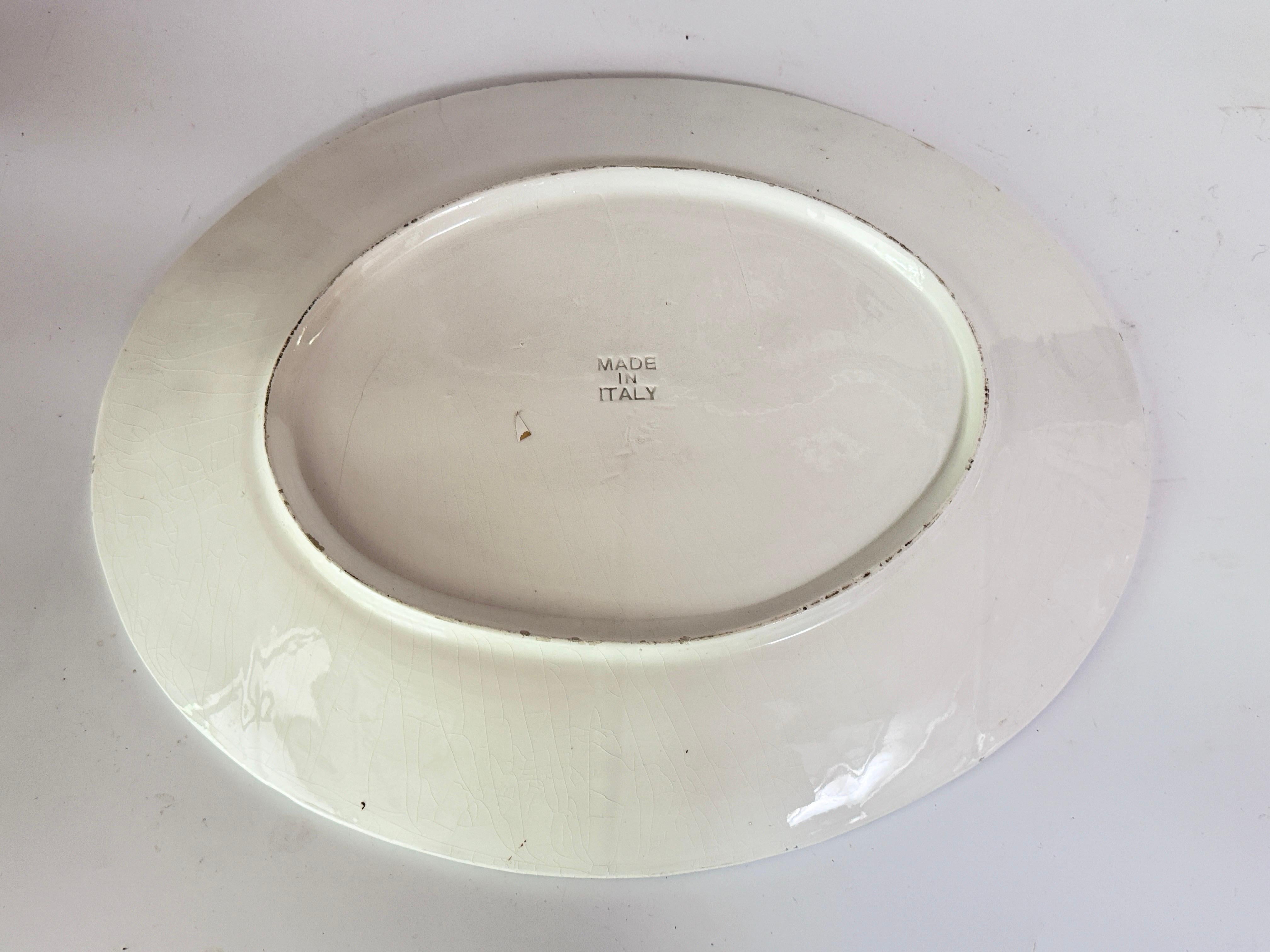   Plato antiguo grande de loza esmaltada blanca Firmado
