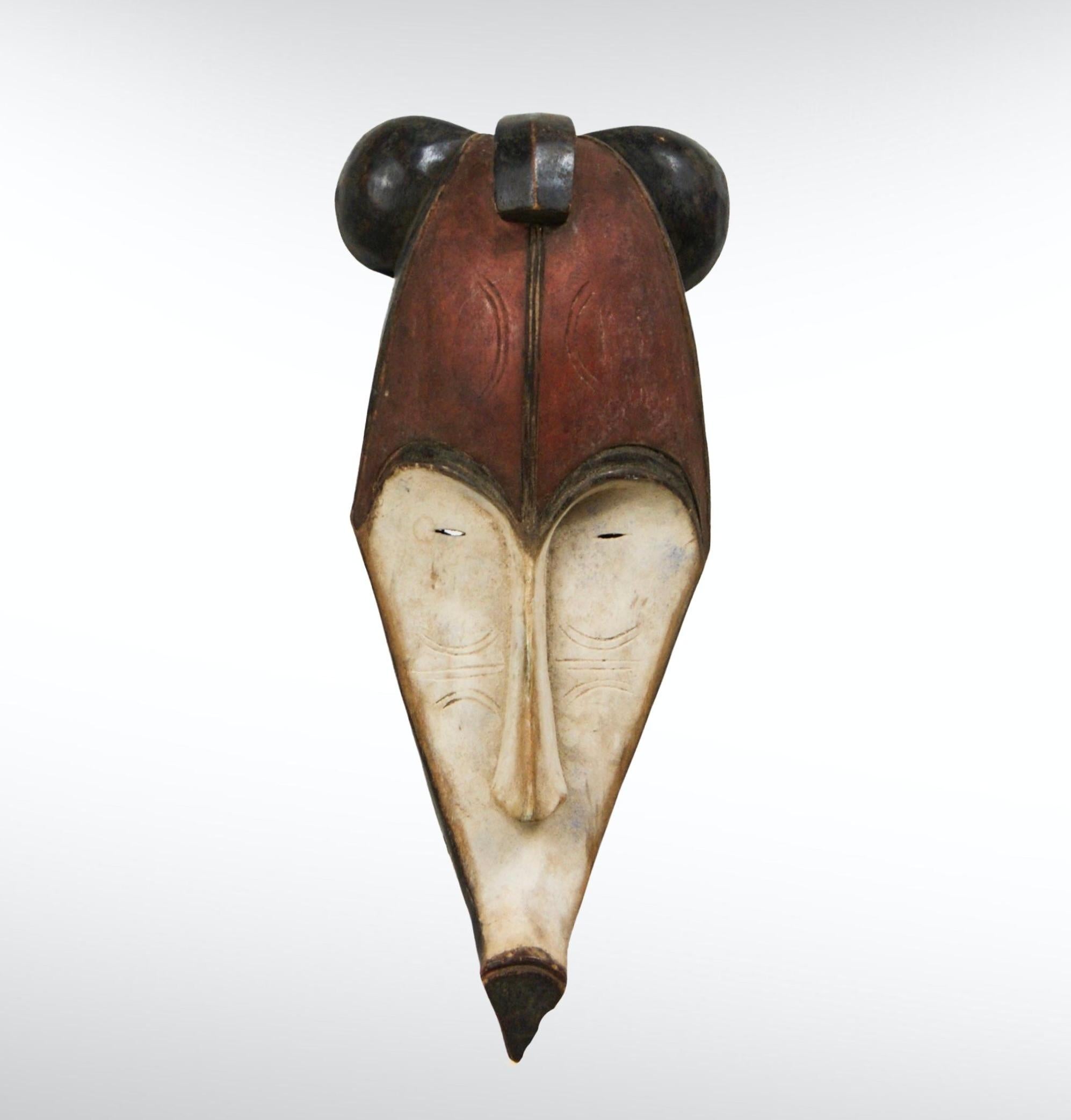 Large sized Fang Ngil mask from Gabon Africa circa 1910s.
The Ngil were a powerful 'Male Only' secret society originating within the Fang people of Gabon.
They were tasked with administering justice, policing the community and they also formed a