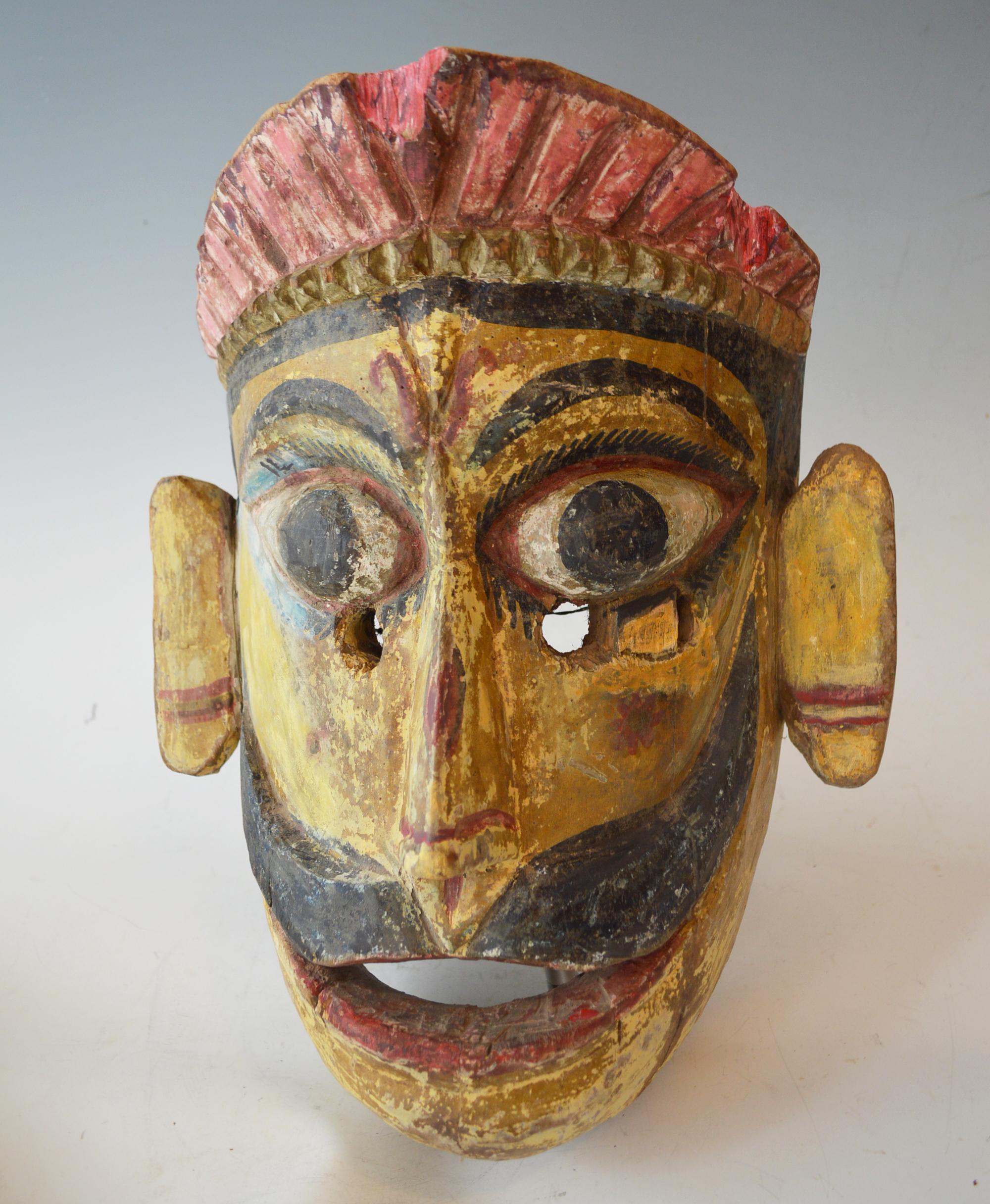 A impressive large old Nepalese ritual festival mask of Indra,
These type of masks are used in the Ramayana theater performances and puja festivals and represent Indra or Shiva
Period early 20th century, from a UK collection.
Hard wood with