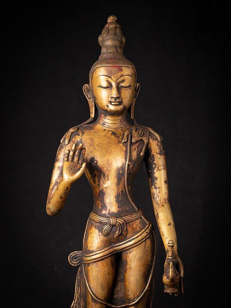 Material: bronze
75 cm high 
30,5 cm wide and 27,5 cm deep
Weight: 14 kgs
Abhaya mudra
Originating from Nepal
Early 20th century
Very nice quality!.
 