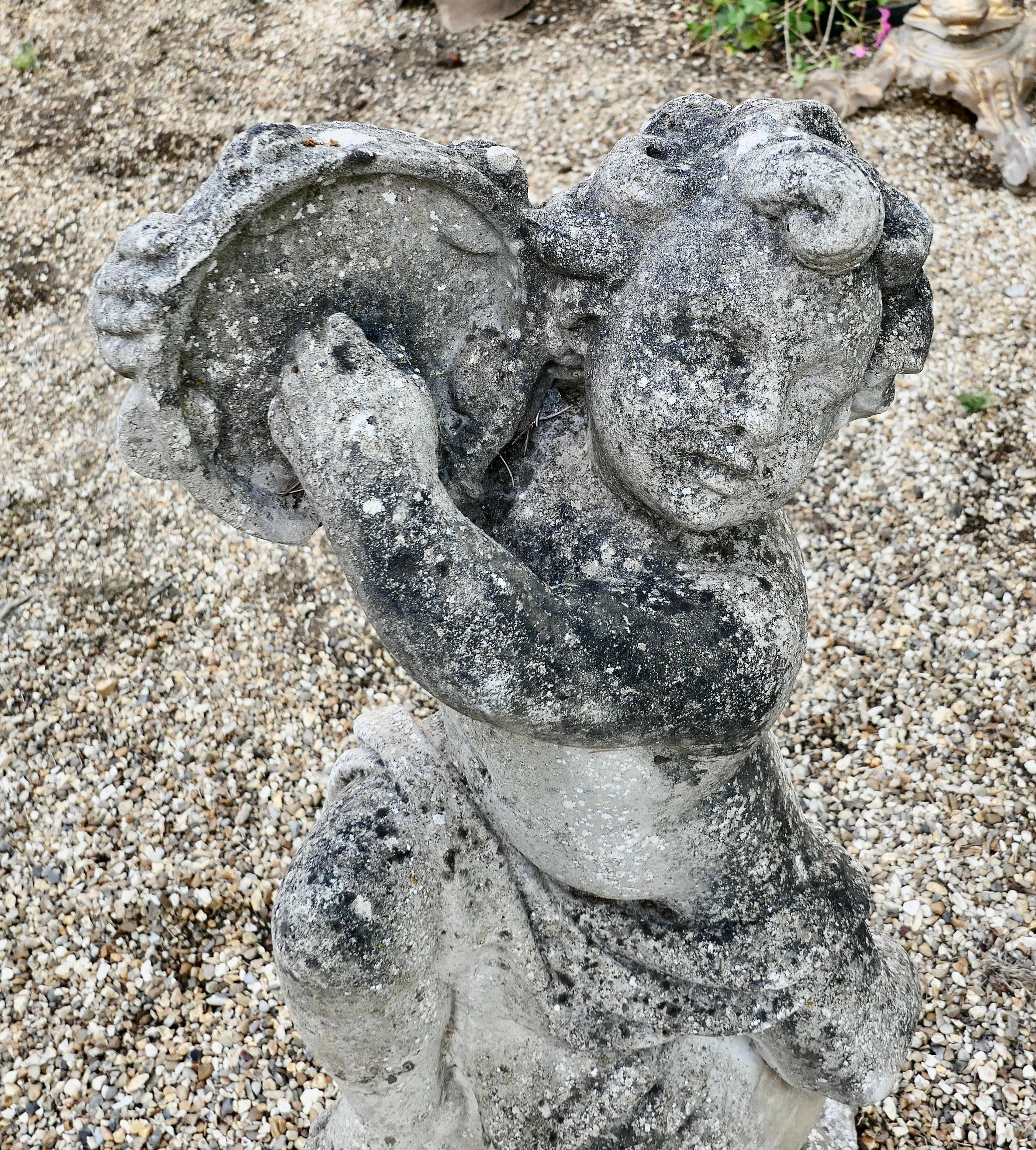 20th Century Large Old Weathered Statue of a Putti Playing Tambourine