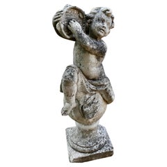 Large Old Weathered Statue of a Putti Playing Tambourine