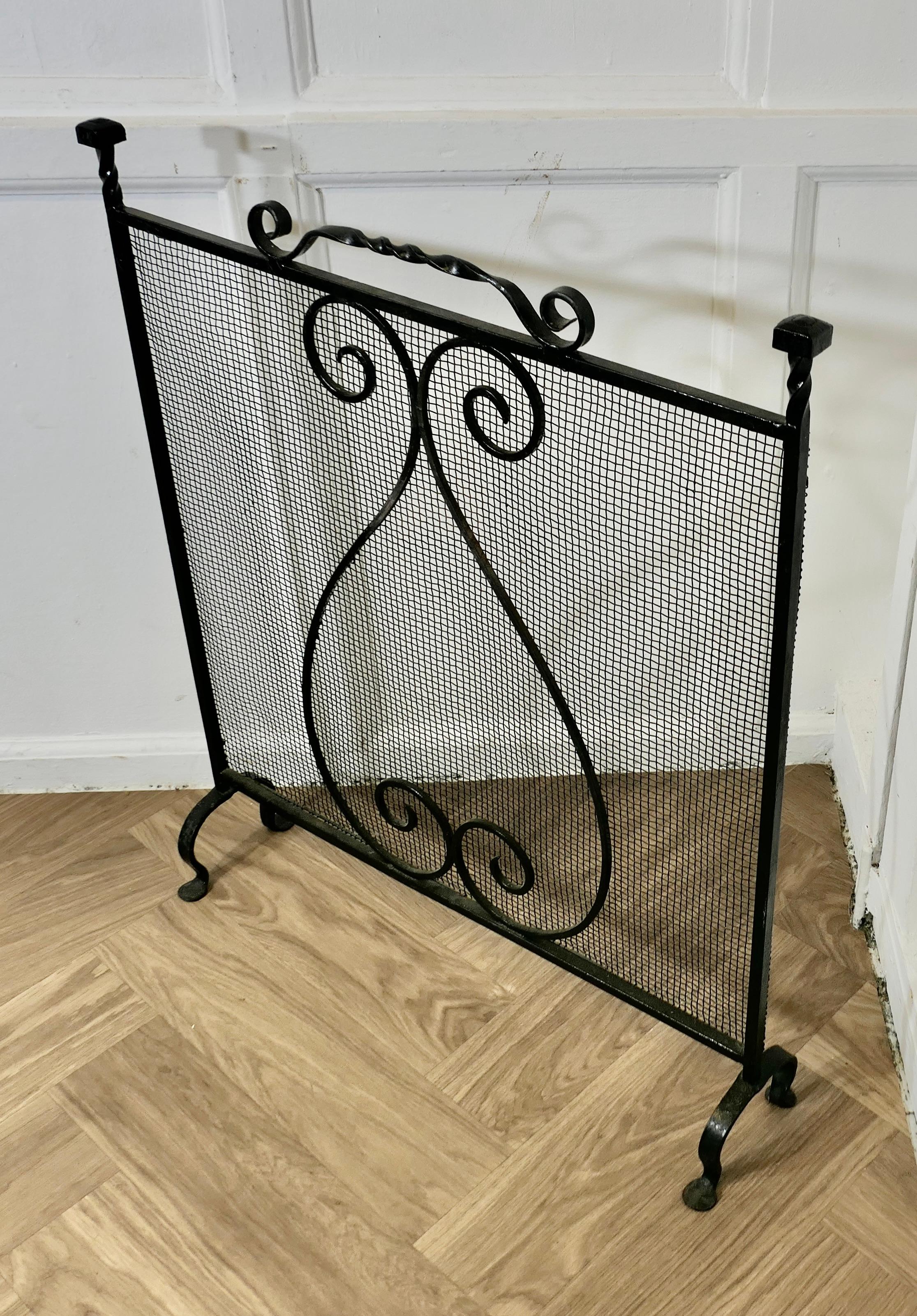 Early 20th Century Large Old Wrought Iron Fire Screen  This is a very useful piece, with a fine mes For Sale