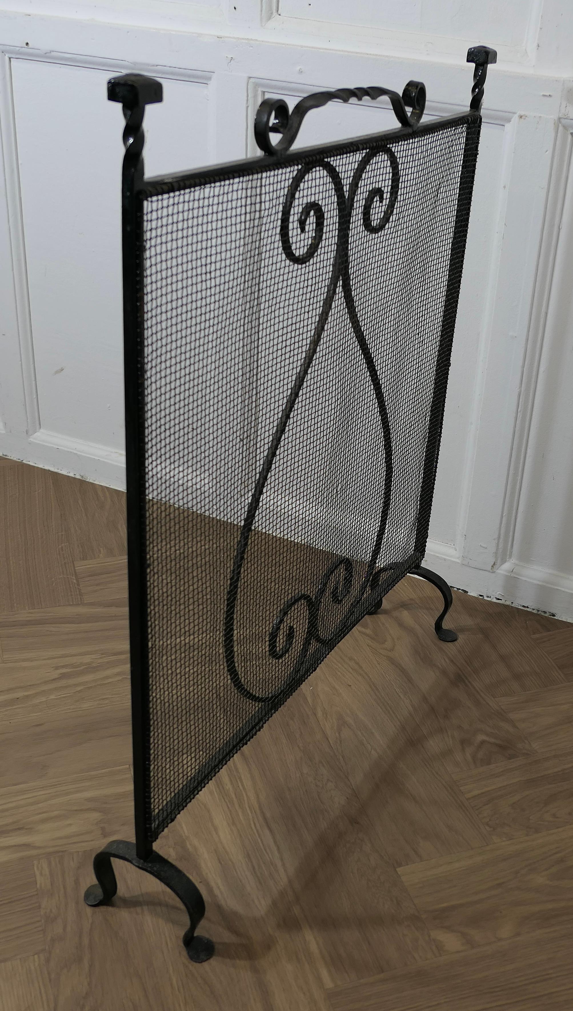 Large Old Wrought Iron Fire Screen  This is a very useful piece, with a fine mes For Sale 1