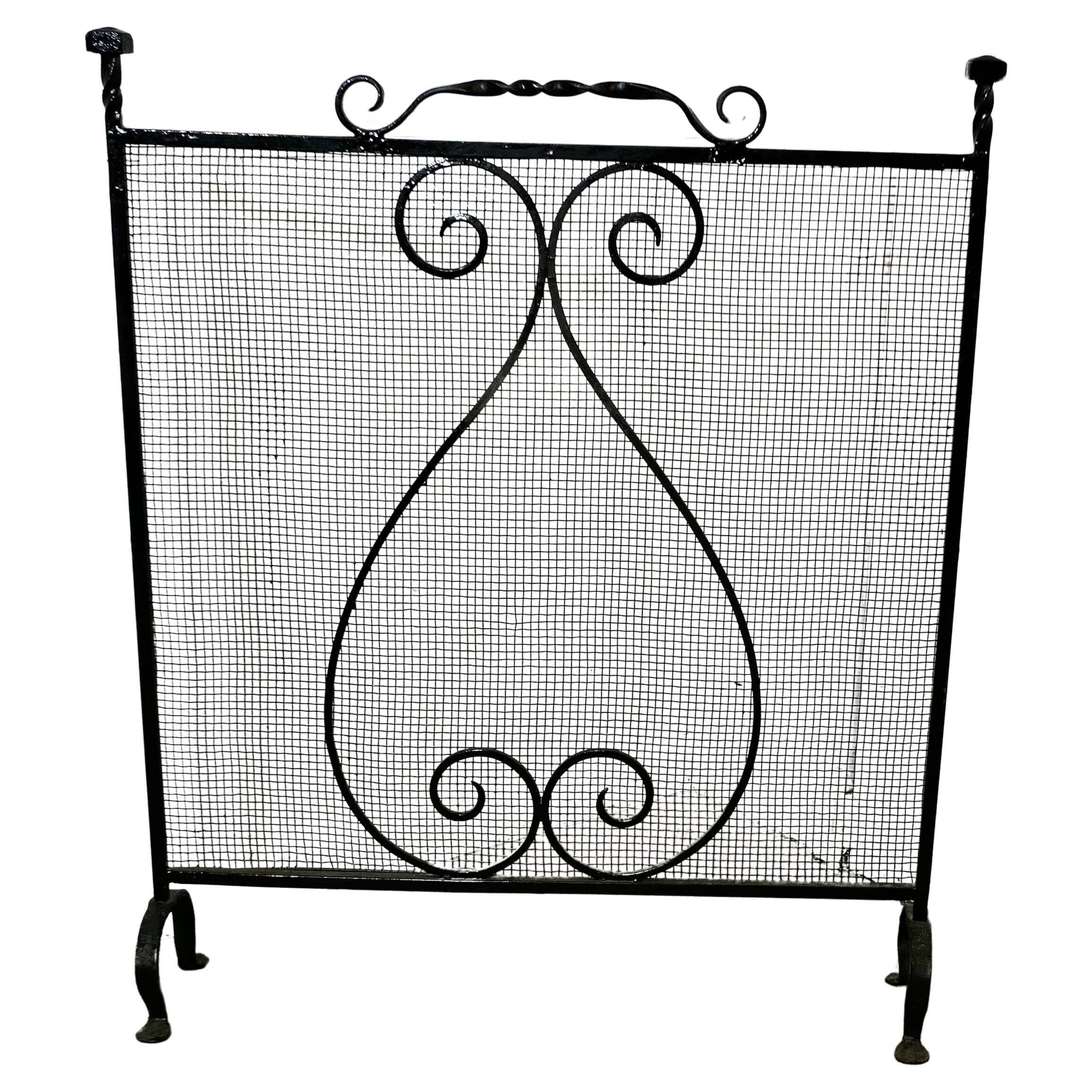 Large Old Wrought Iron Fire Screen  This is a very useful piece, with a fine mes For Sale