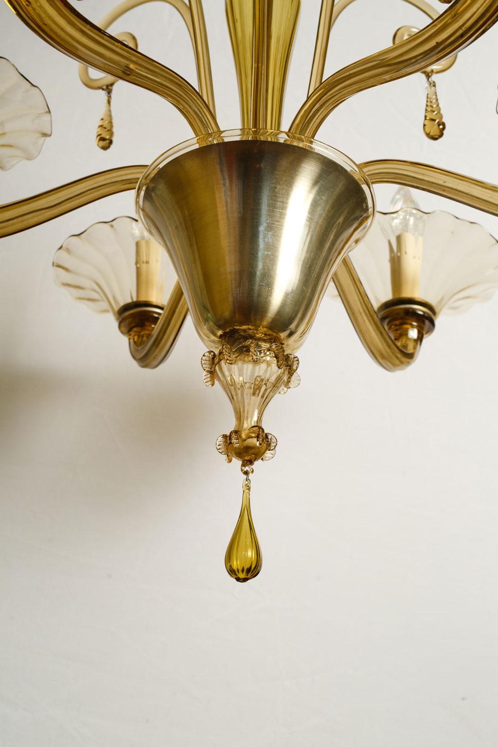 Large olive-tinted glass chandelier from Murano. Nice large scale clear blown-glass chandelier in olive tint. This Classic style light has six arms with candelabra-size sockets. Newly wired for use within the USA. Includes chain and a canopy.