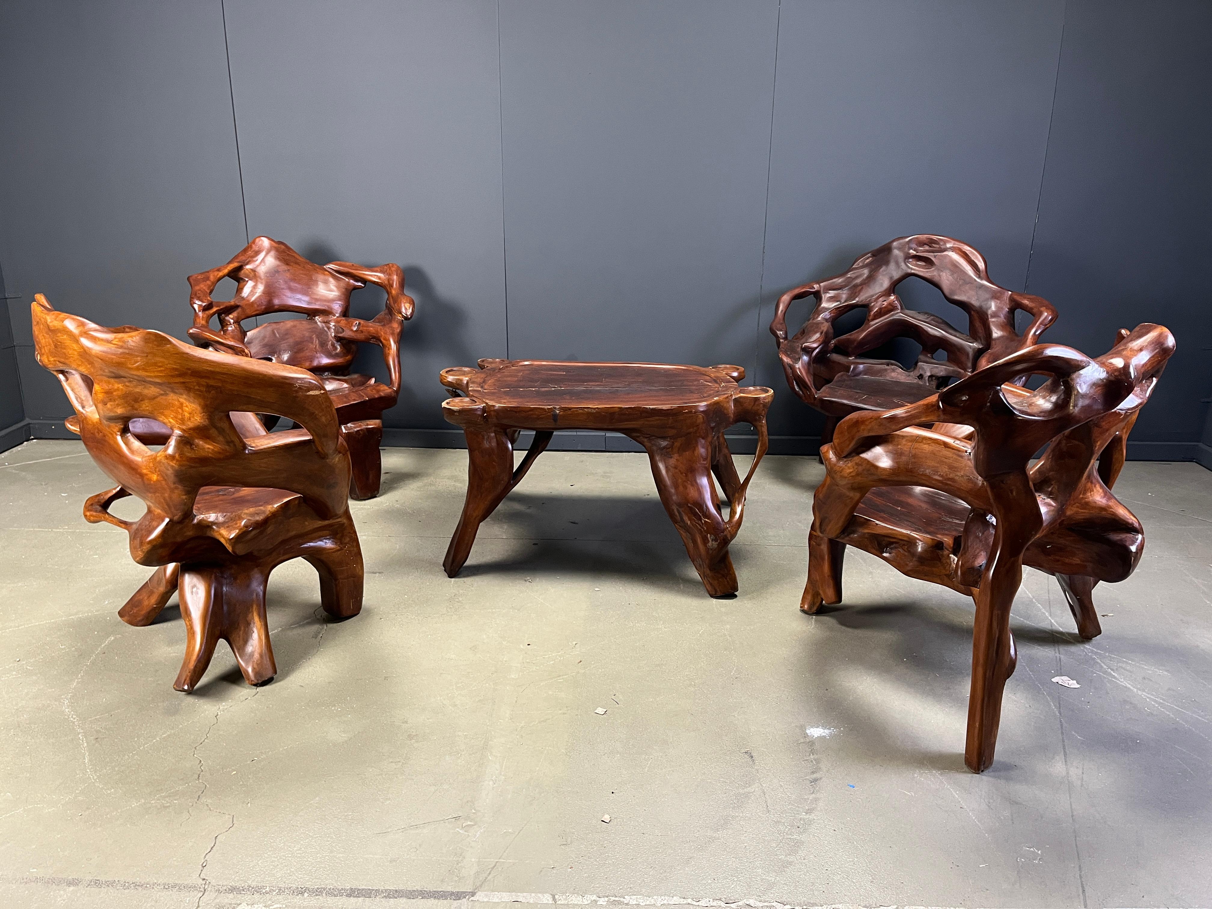 Stunning large solid olive tree root armchairs set with table.

Beautifully organically shpaed set of chairs which will last forever.

Great piece(s) for in a shop, hallway, or a living room.

We can sell per item or as a set, the showed price is