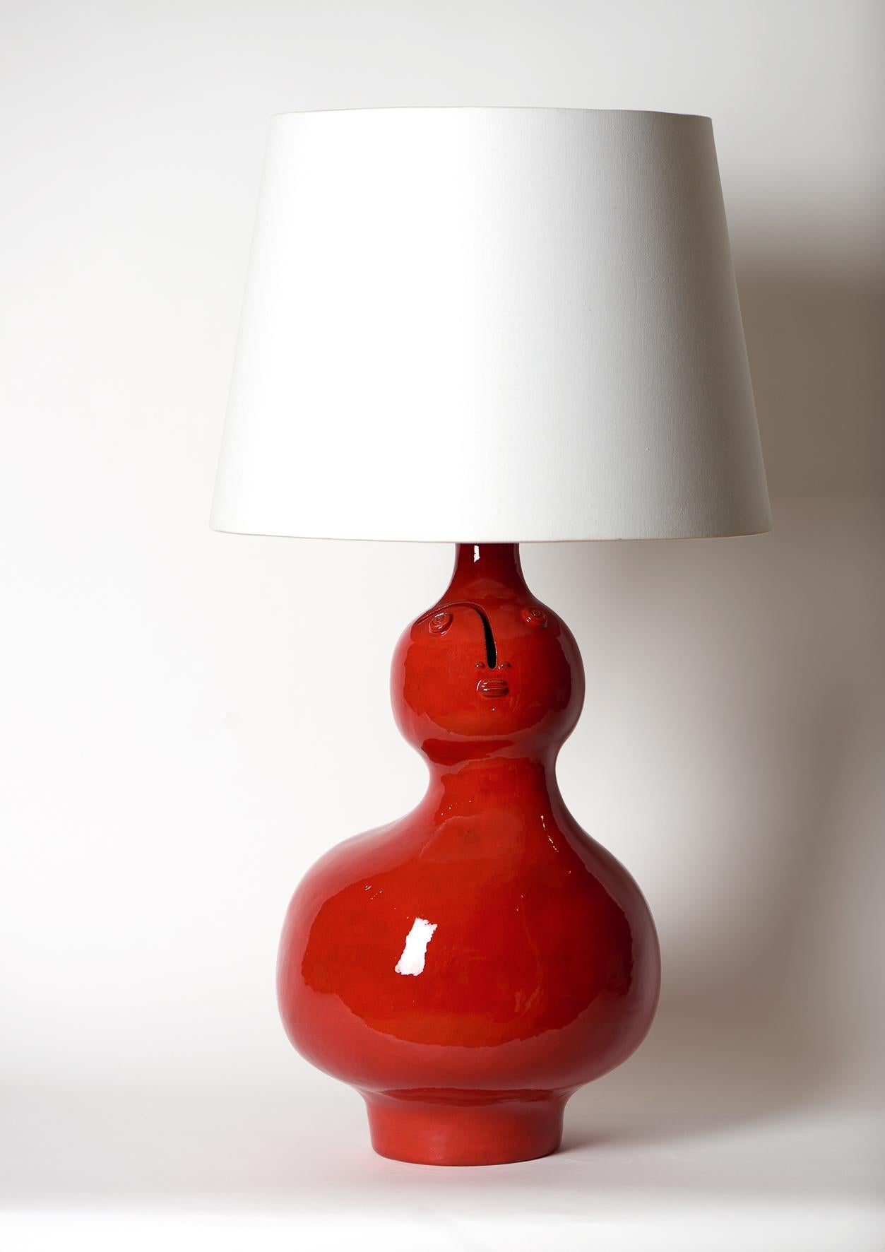 Large hand-sculpted ceramic lamp base, stoneware glazed in shiny red enamel 

One of a kind handmade piece signed by the French ceramicists Dalo. 

The height dimension is for the ceramic sculpture solely : without the electrical bulb system on