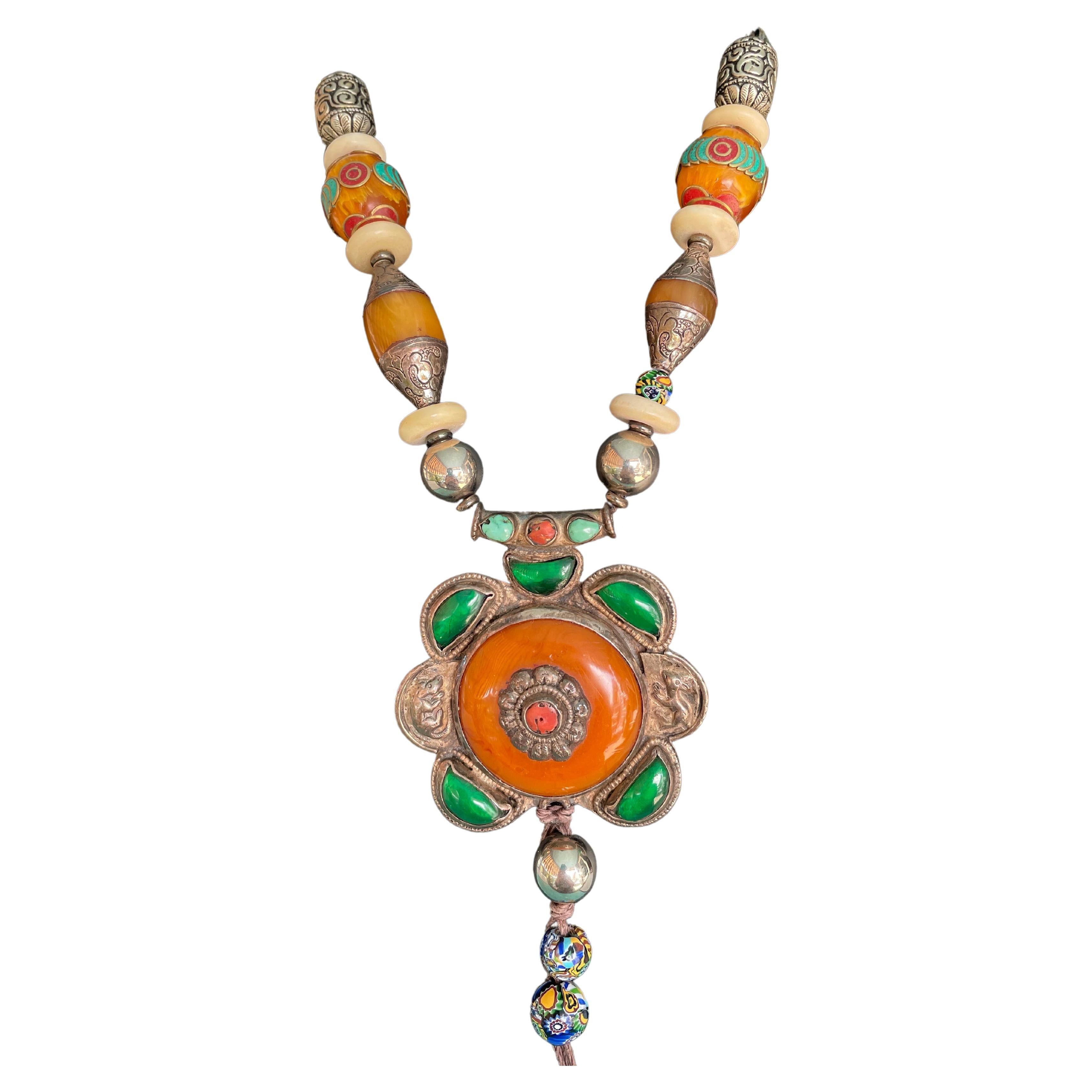 Large one of a kind, handmade, statement necklace with Tibetan pendant. For Sale