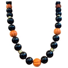 Large Onyx and Carved Coral Bead and Diamond Necklace