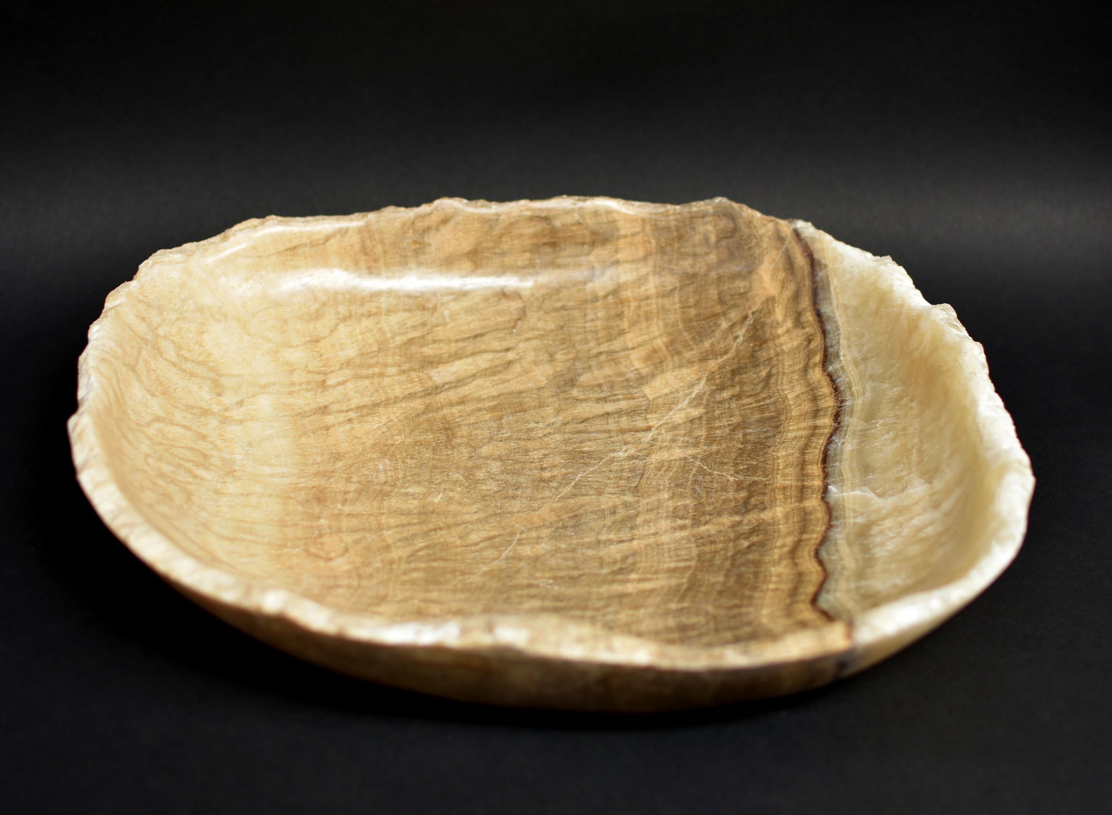 An elegant hand carved premium all natural Indonesian onyx bowl/platter with beautiful 