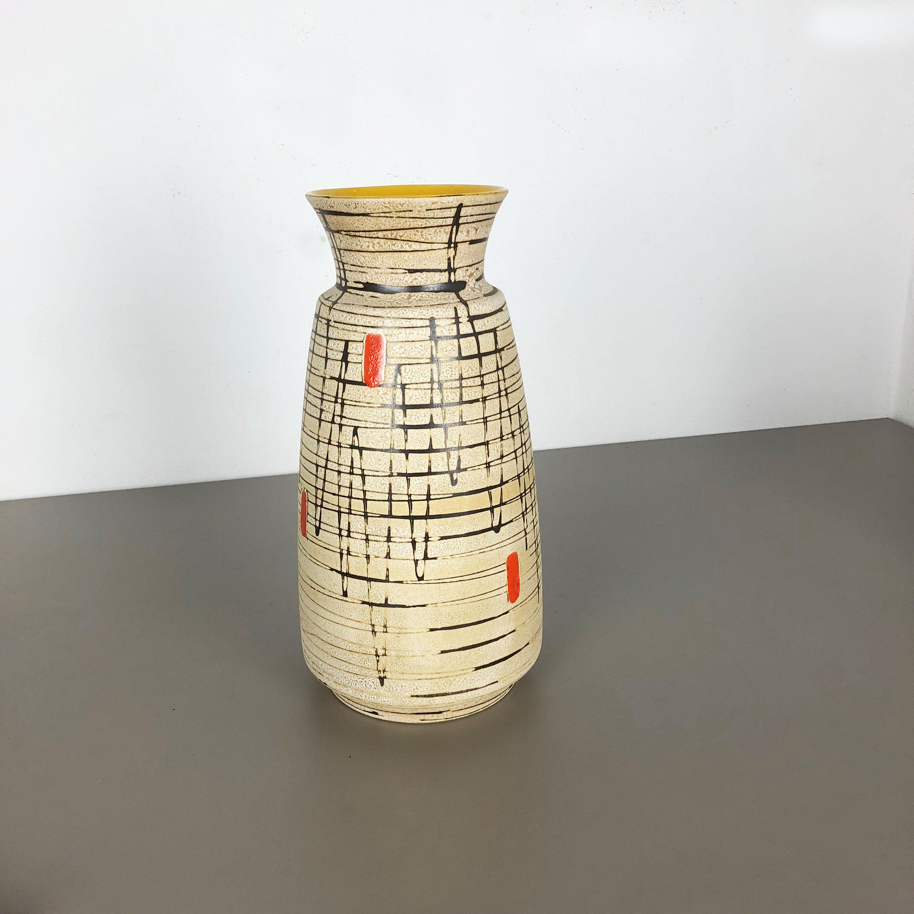 Article:

Pottery ceramic vase


Producer:

BAY Ceramic, Germany


Decade:

1960s





Original vintage 1960s pottery ceramic vase made in Germany. High quality German production with a nice abstract illustration and super rare