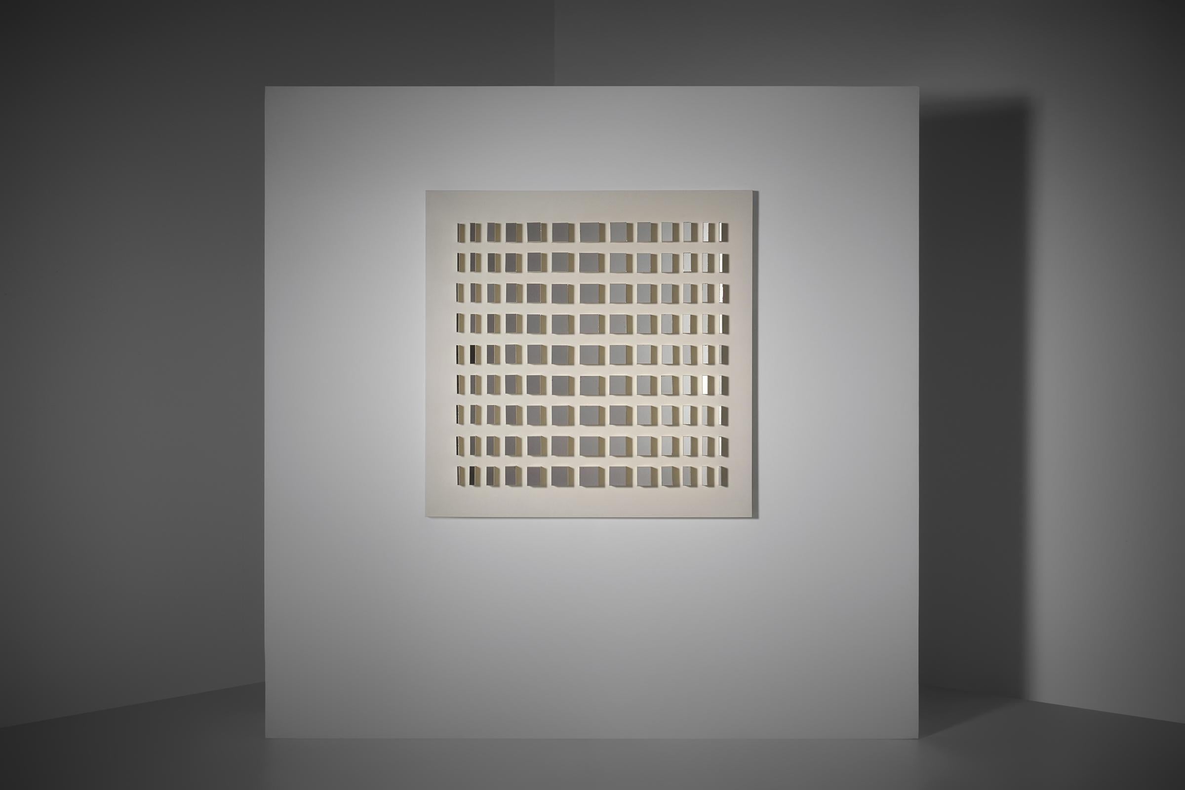 Impressive large Op Art mirror by Godfried Lonis (September 1916 – January 2007), The Netherlands 1976. A unique work composed of a cream-white lacquered panel featuring 117 mirrored wooden blocks, arranged in a graduated formation: wider at the