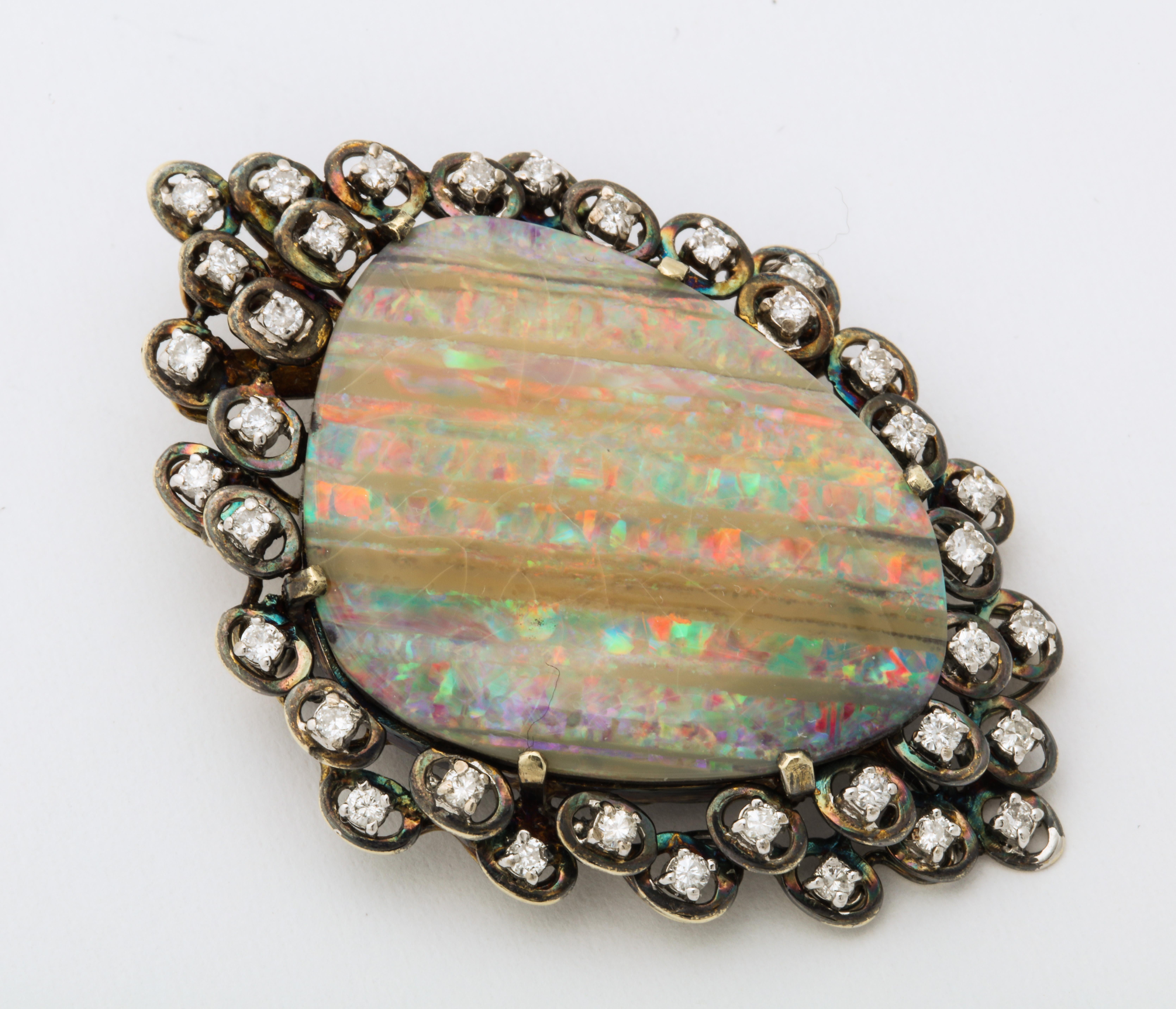 Large Opal Brooch or Pendant Surrounded by Diamonds Set in Gold In Good Condition In New York, NY