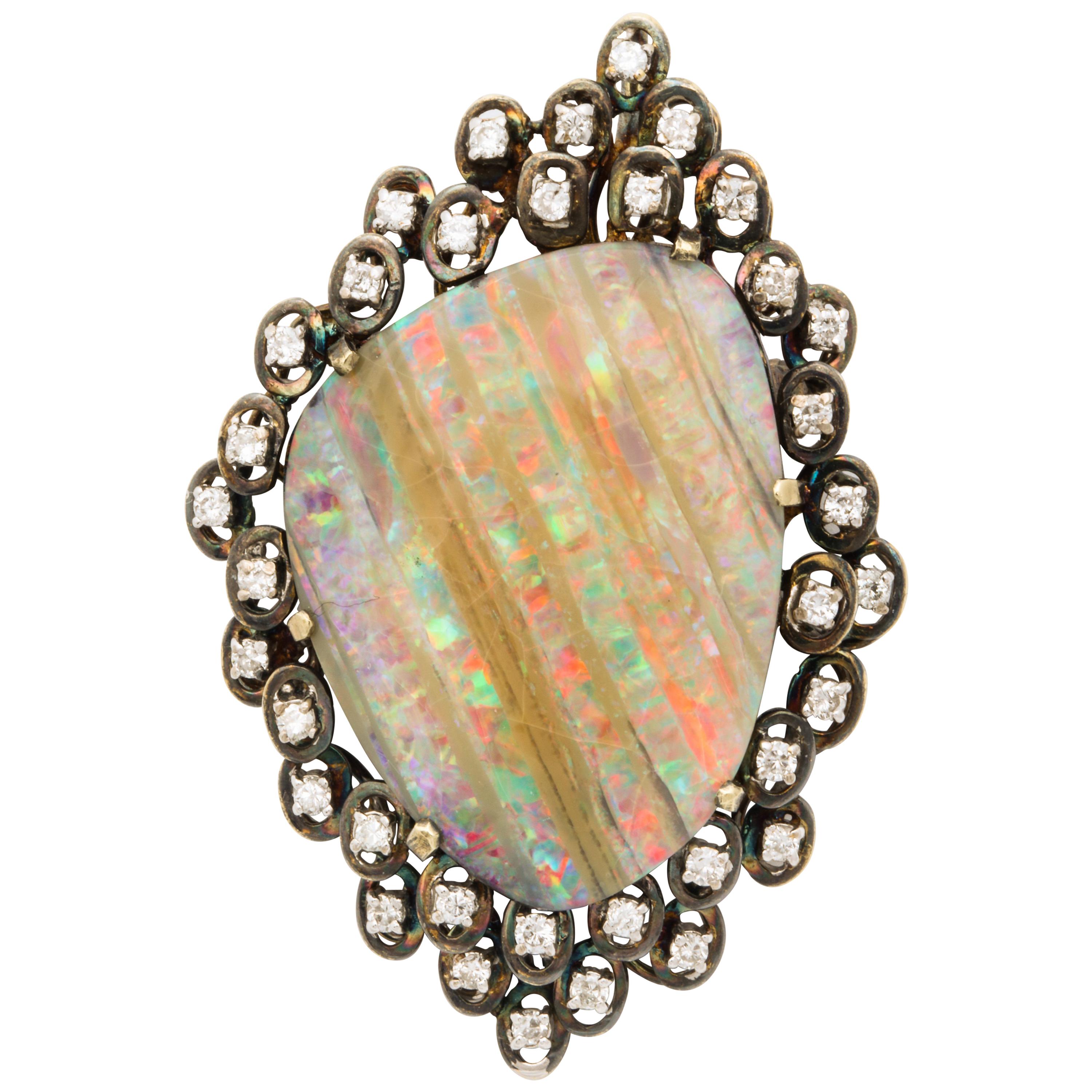 Large Opal Brooch or Pendant Surrounded by Diamonds Set in Gold