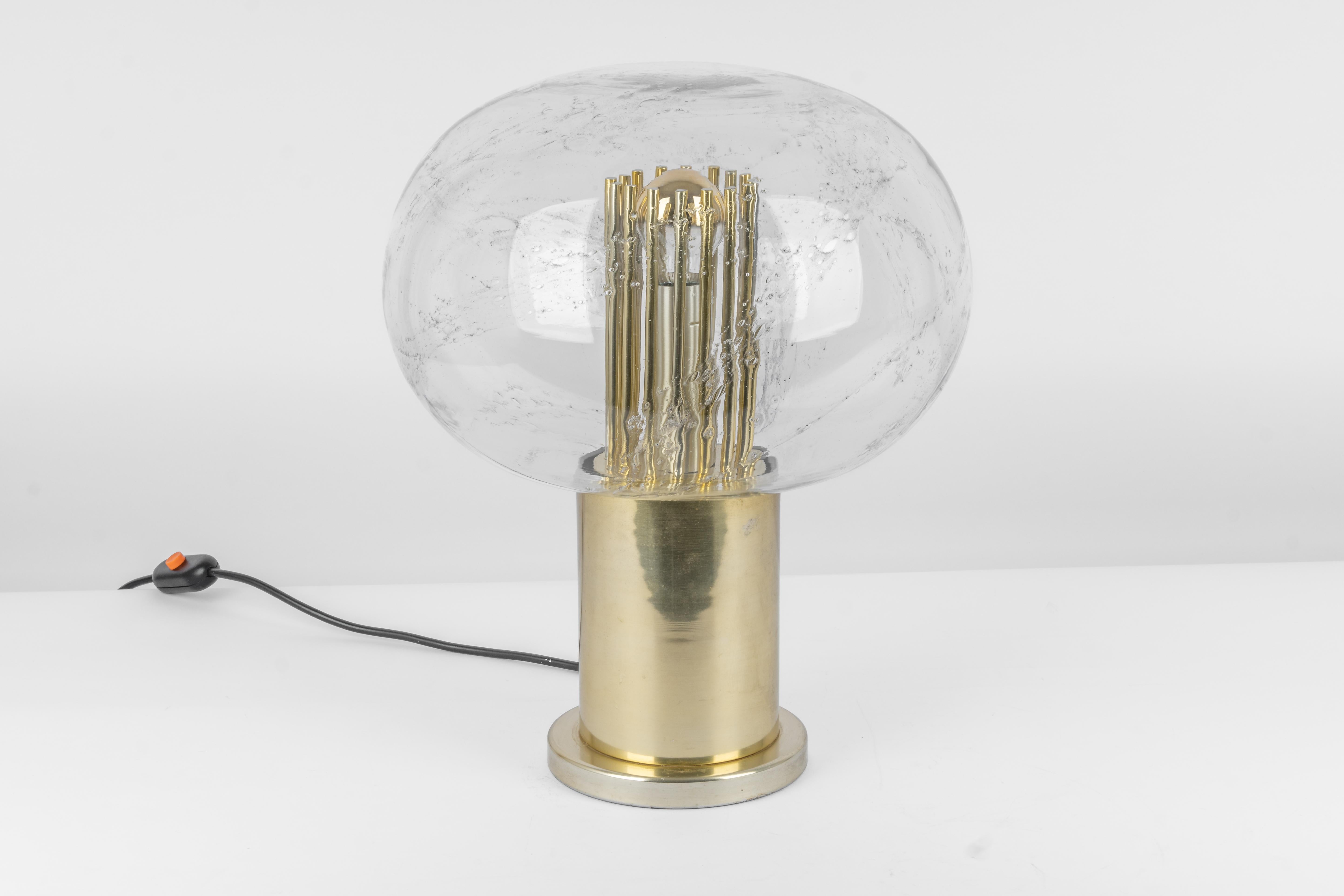 A spectacular vintage table lamp, made by Doria and it dates from the 1960-70’s.

This is beautifully made with a large glass shade and gold color frame. It is a fantastic size; it’s very impressive and in great original condition. 

This is in good