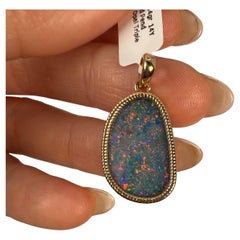 Large opal pendant 14KT yellow gold