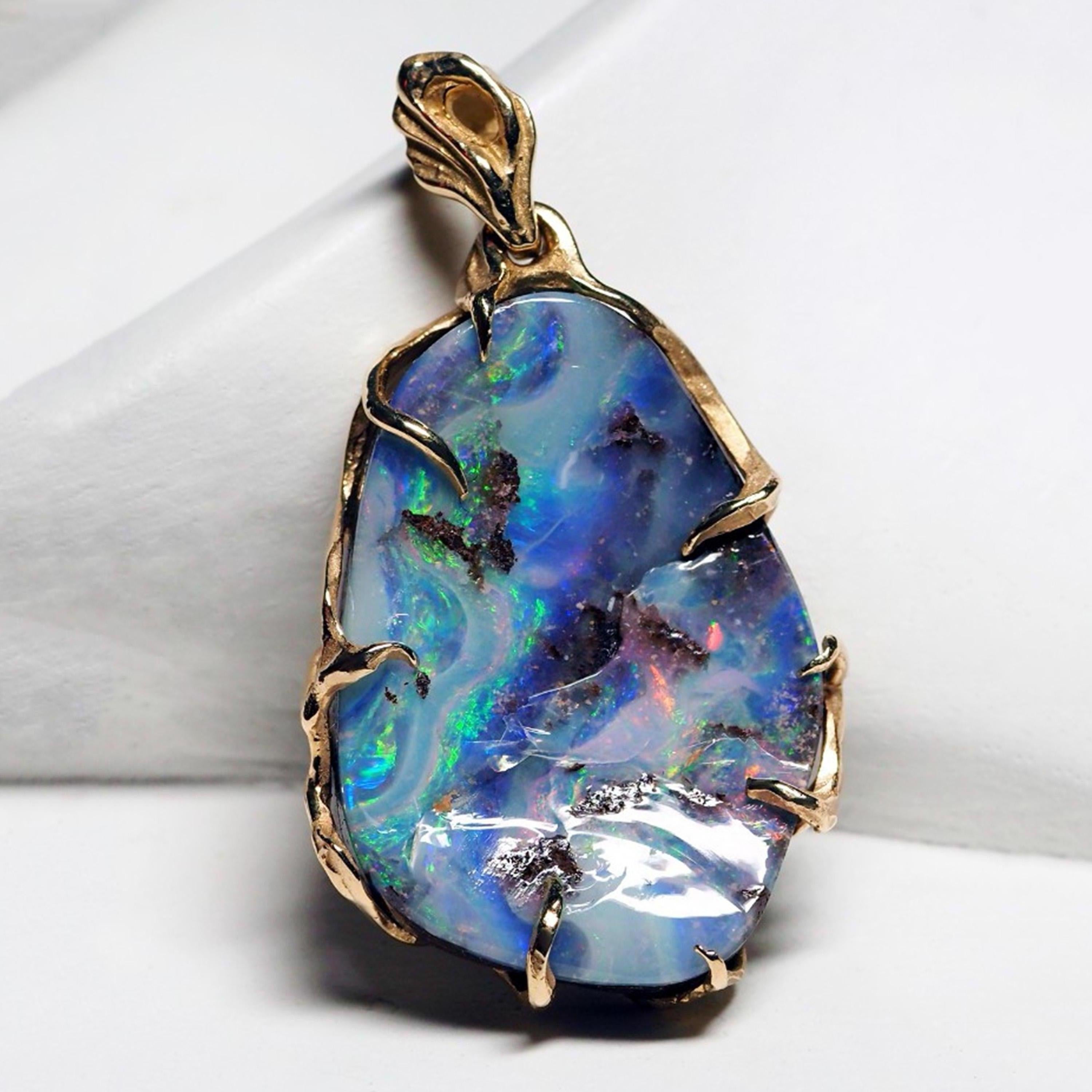 14K yellow gold pendant necklace with Boulder Opal
opal origin - Australia
opal measurements - 0.12 x 0.67 x 1.02 in / 3 x 17 x 26 mm
gemstone weight - 22.25 carats
pendant length - 1.22 in / 31 mm
pendant weight - 7.21 grams


We ship our jewelry