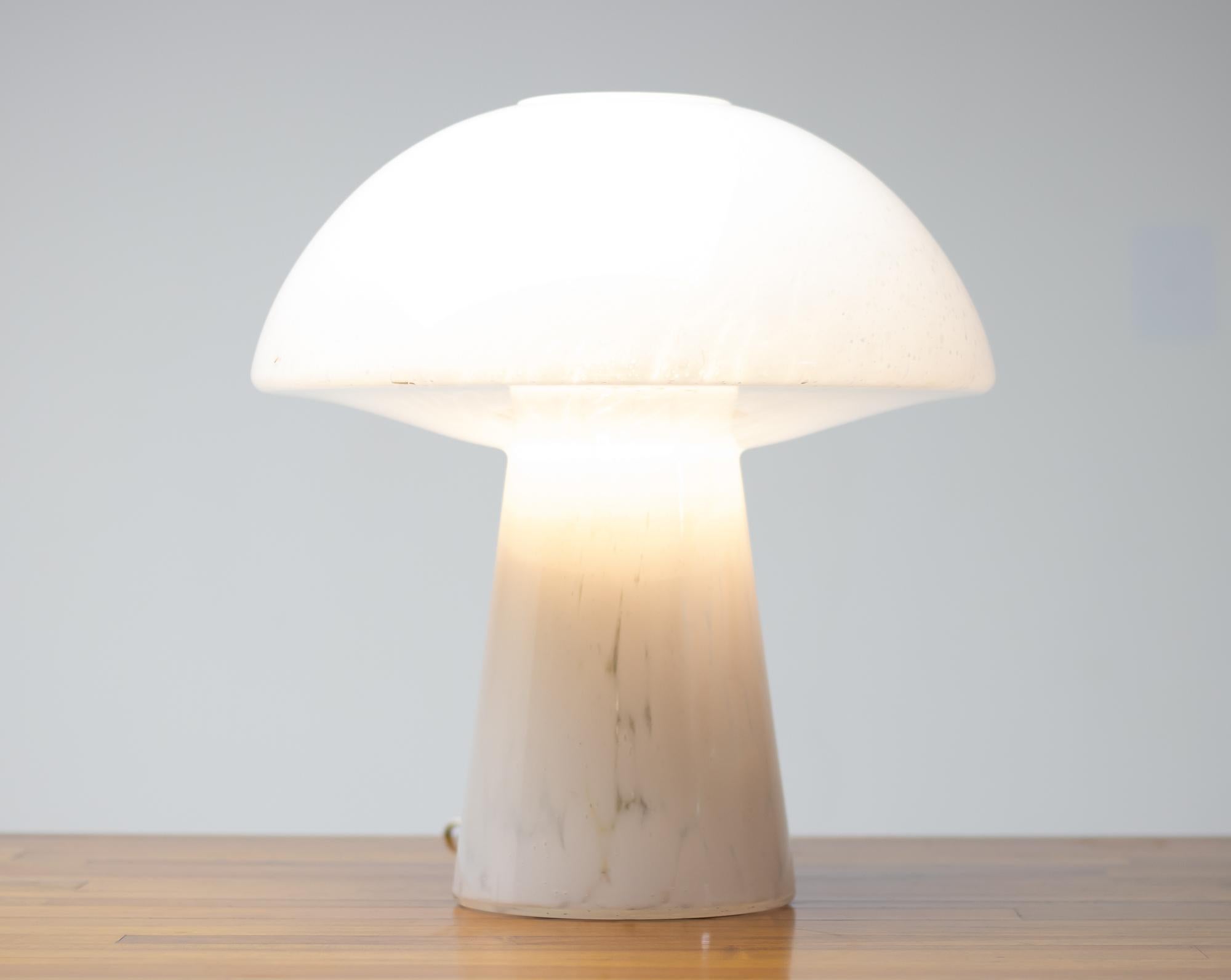 Exceptional large table lamp in online glass by Glashütte Limburg Leuchten, circa 1970.
Marked with label at the base, suitable for use in the US.