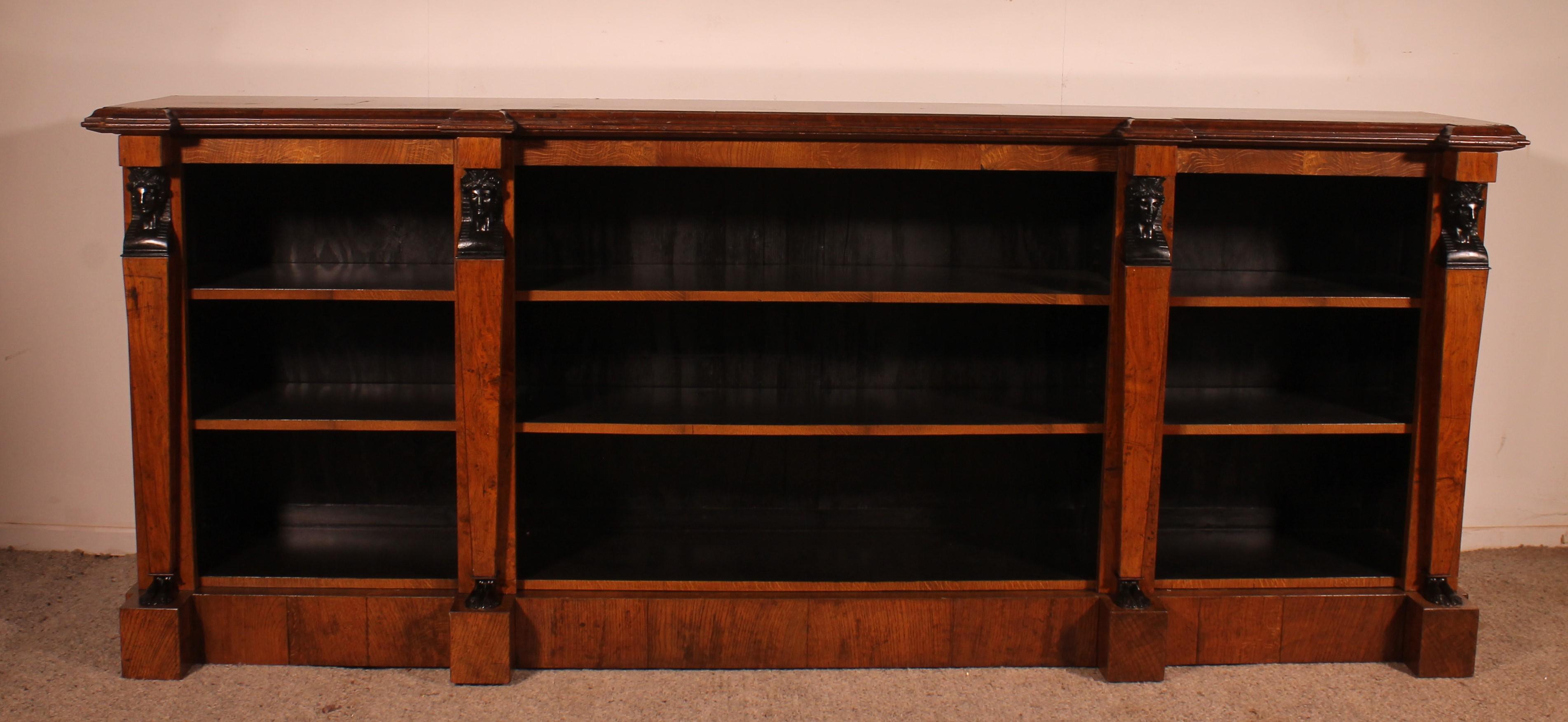 Elegant large open oak bookcase style retour d'égypte (come back from Egypte / Empire) from the second half of the 19th century - France
This still was made when Napoléon came back from Egypte.

Superb work composed of three sections with the front