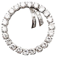 Large Open Circle and Bow 5.50 Carats Diamond Brooch / Pendant Set in Platinum