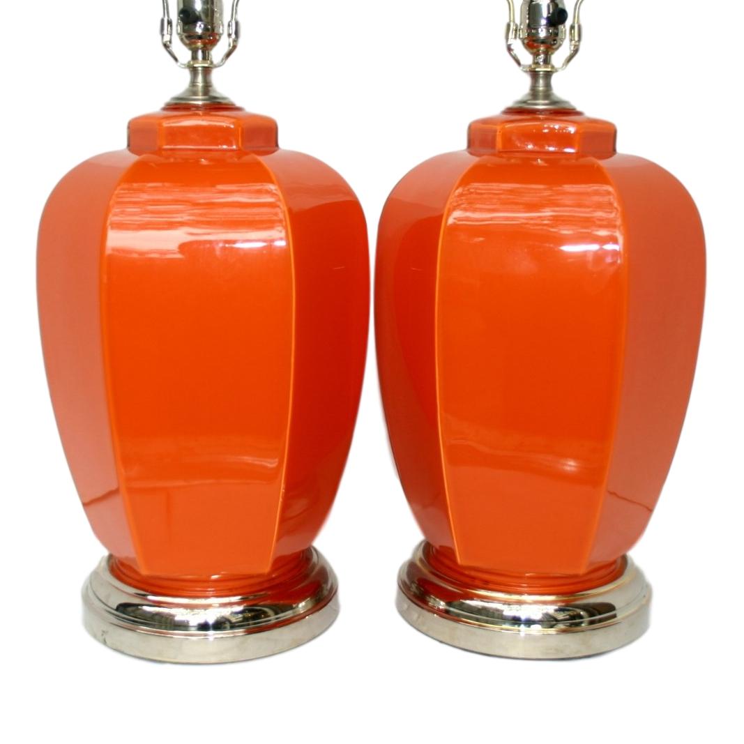 Pair of circa 1960s French large orange glass ginger jar shaped table lamps with nickel plated bases.

Measurements:
Height of body 16