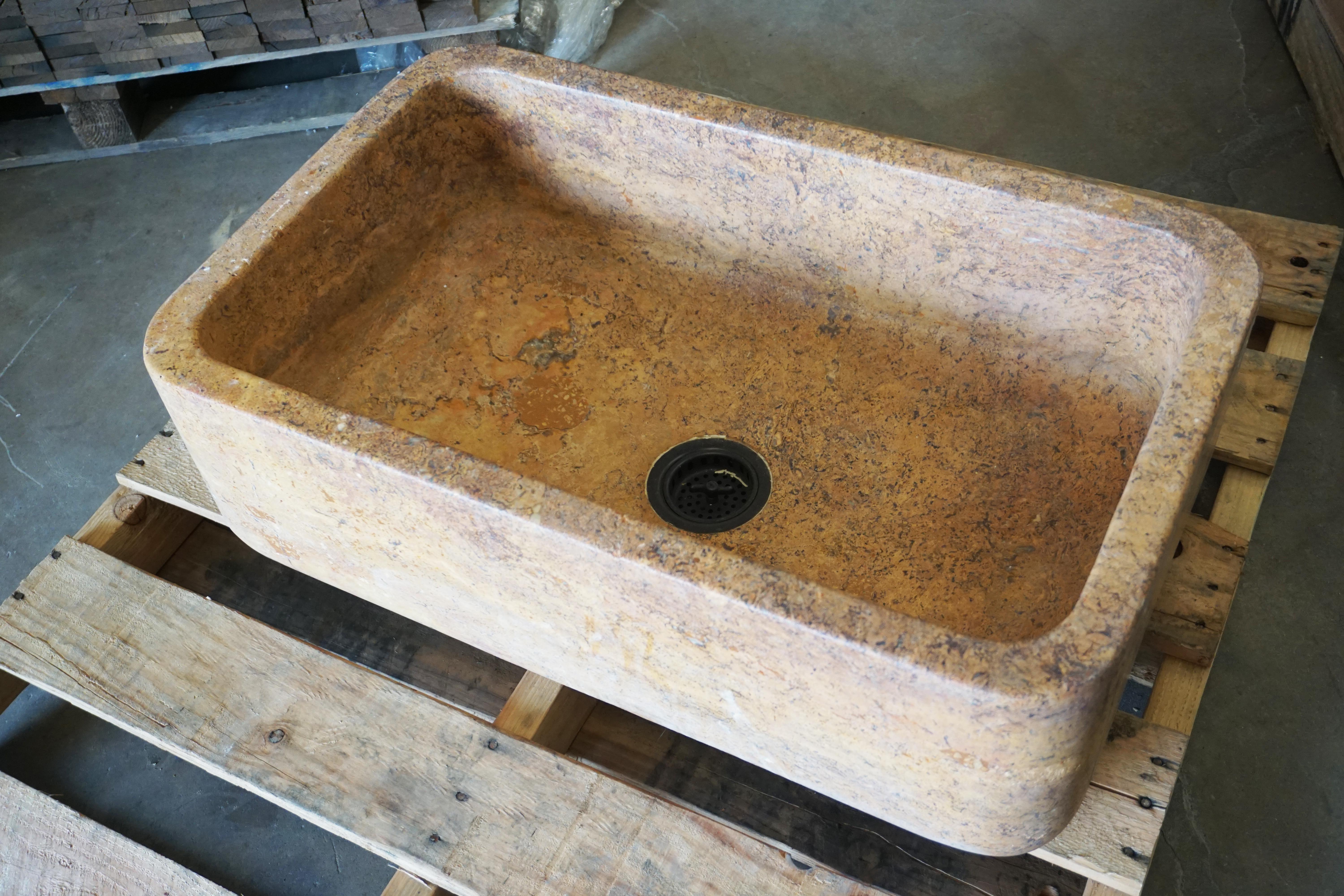 This large stone sink is perfect for a rustic home project. Sturdy and ready for install with black drain (see in photo).

Measurements: 30