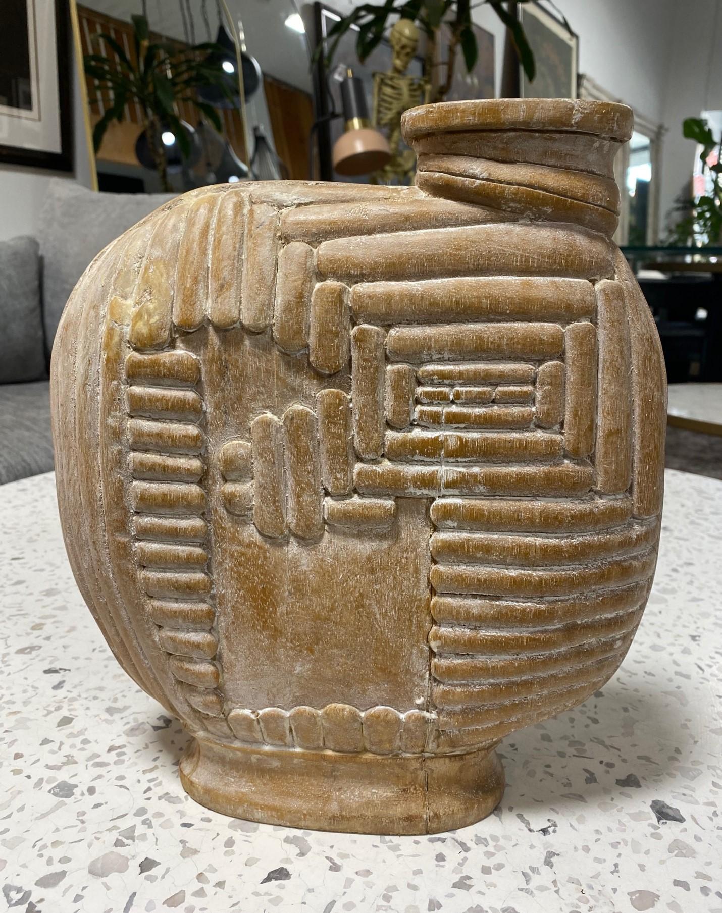 A beautiful Mid-Century Modern hand-carved natural organic wood art sculpture/ vase/ vessel.  It appears to have been made from a single piece of wood.  

Likely from the 1960s.  

A very bold statement work.  Would be a great addition to any