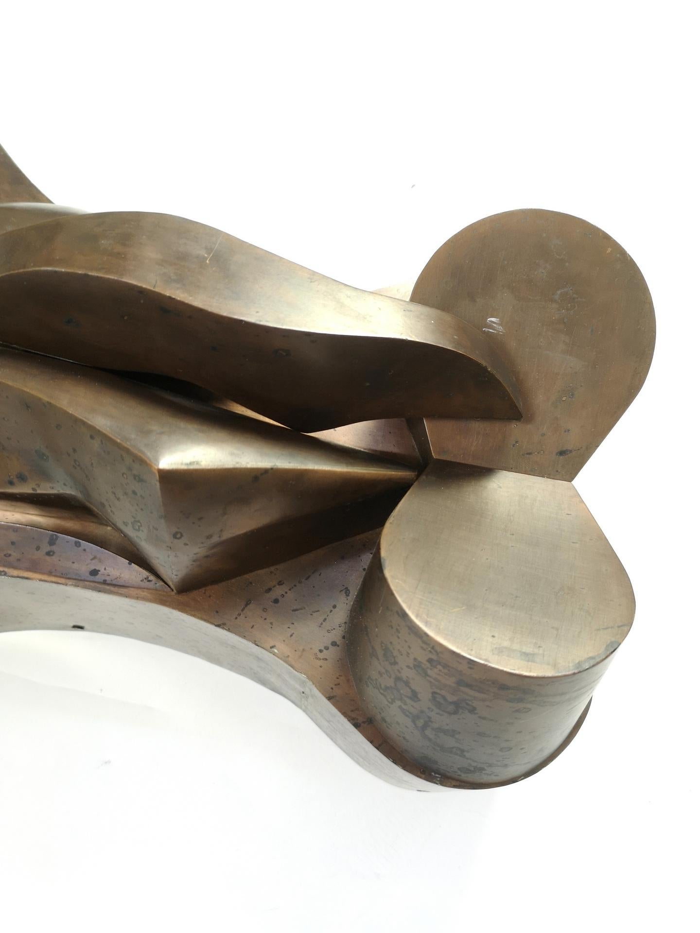 Large organic modern brutalist copper sculpture by Kozsuharov Ognjan. This brutalist piece was made in the 1970's by Ognjan.
He studied on the Hungarian Arts Academy in 1973, graduated as a sculptist. His work as a sculptist is strongly influenced
