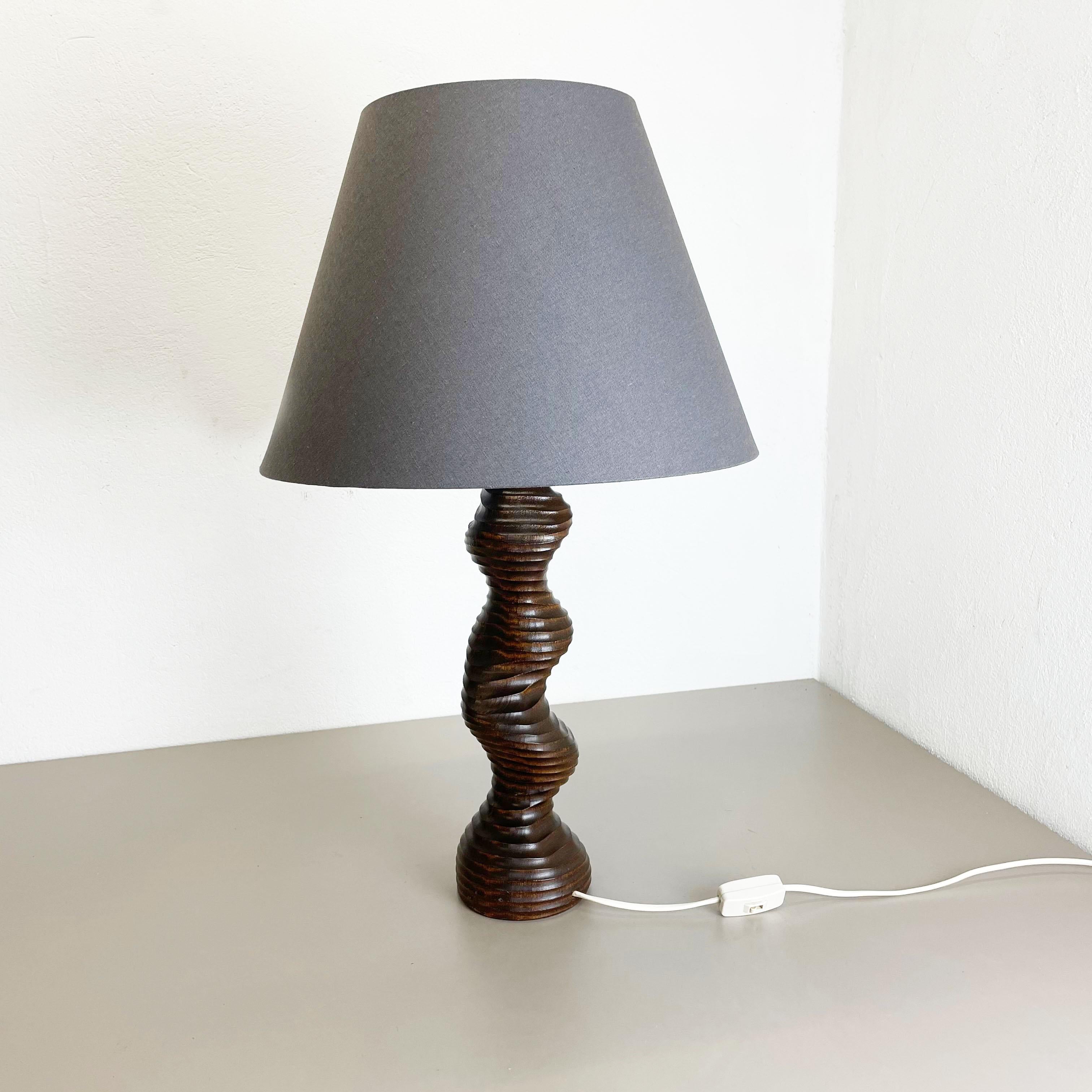 Article:

wooden organic table light


Producer:

TEMDE Lights, Germany



Origin:

Germany



Age:

1970s




Original vintage 1970s wooden table light base made in Germany. High quality German production with a nice