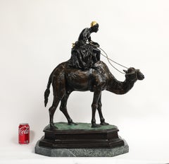 Large Orientalist Bronze Group of Boy Riding a Camel