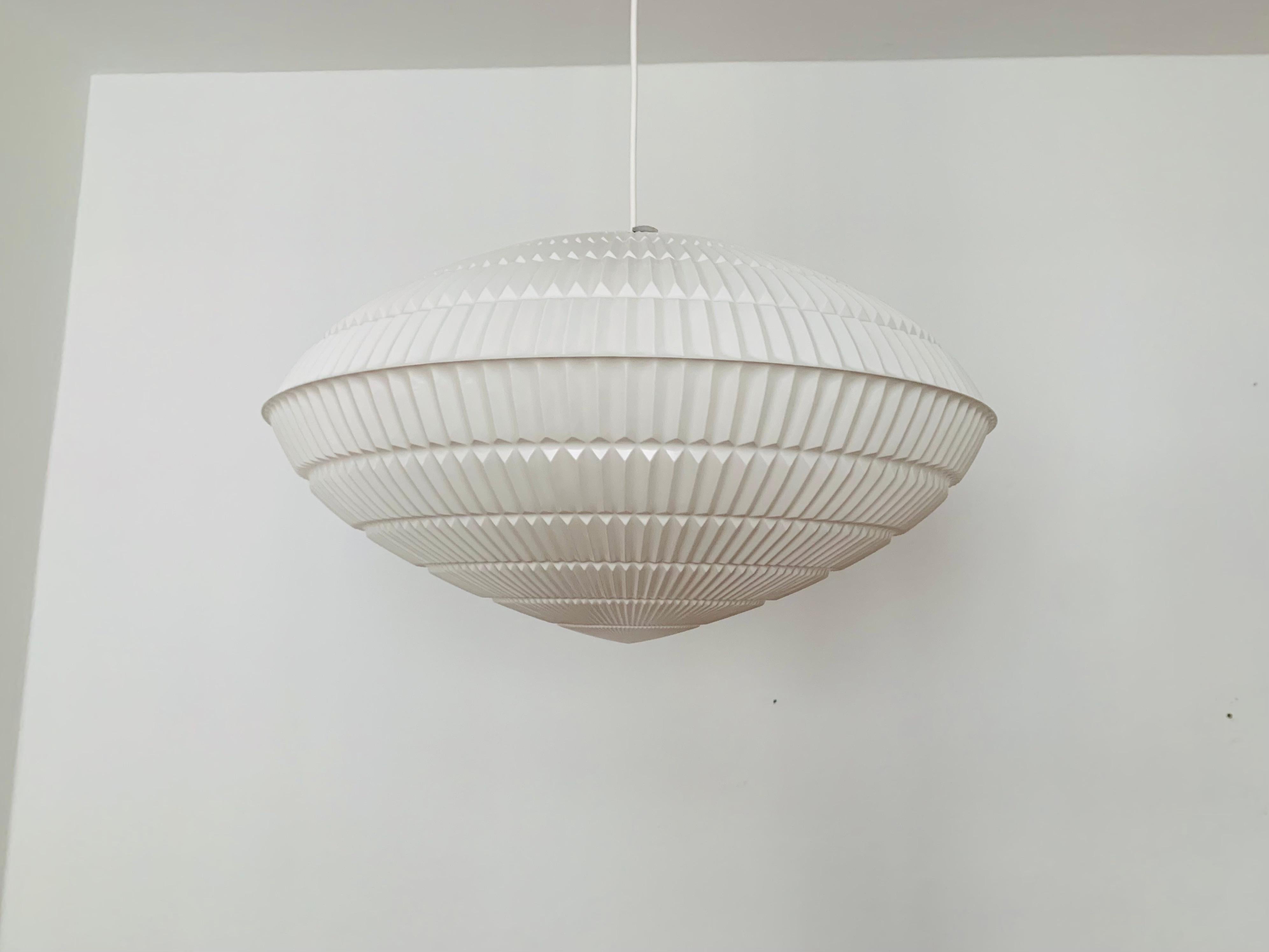 Very nice pendant lamp from the 1960s.
Wonderful and contemporary design.
A highlight for every room.

Manufacturer: Erco
Design: Aloys Gangkofner

Condition:

Very good vintage condition with minimal signs of wear consistent with age.

The pictures