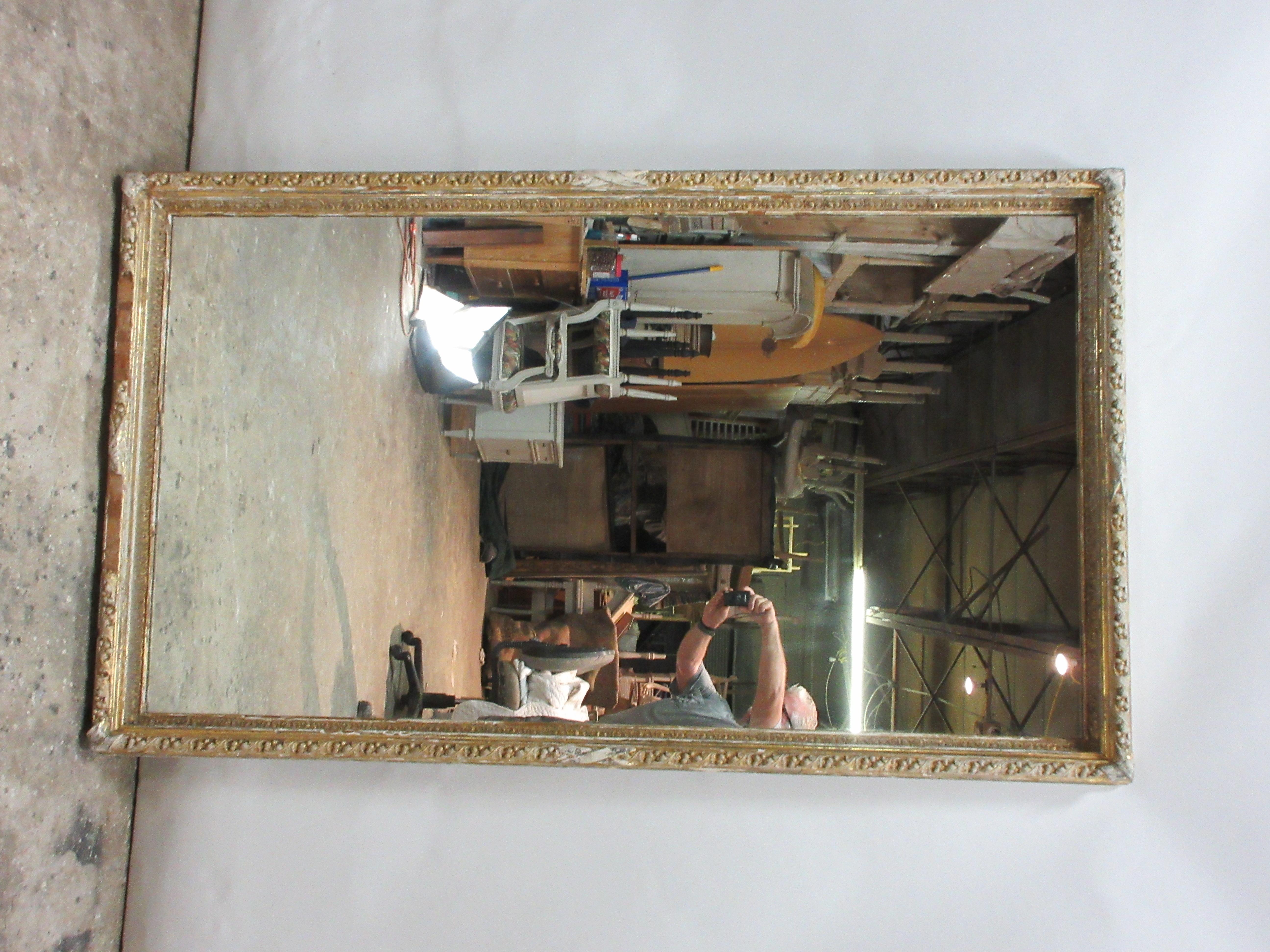 This is a large original finish mirror.