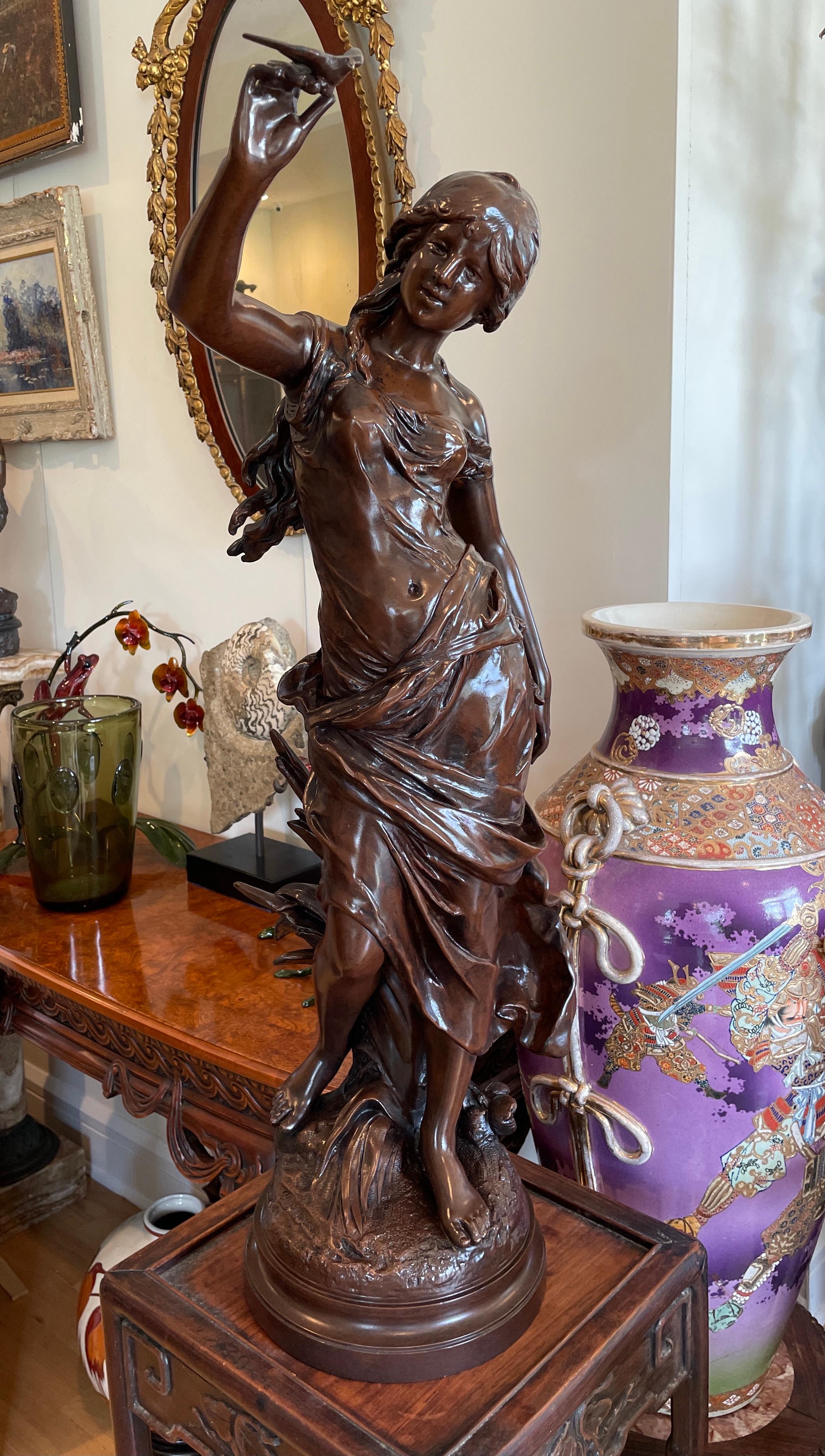 French Woman With Love Bird Sculpture by Auguste Moreau For Sale