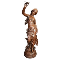 Antique Woman With Love Bird Sculpture by Auguste Moreau