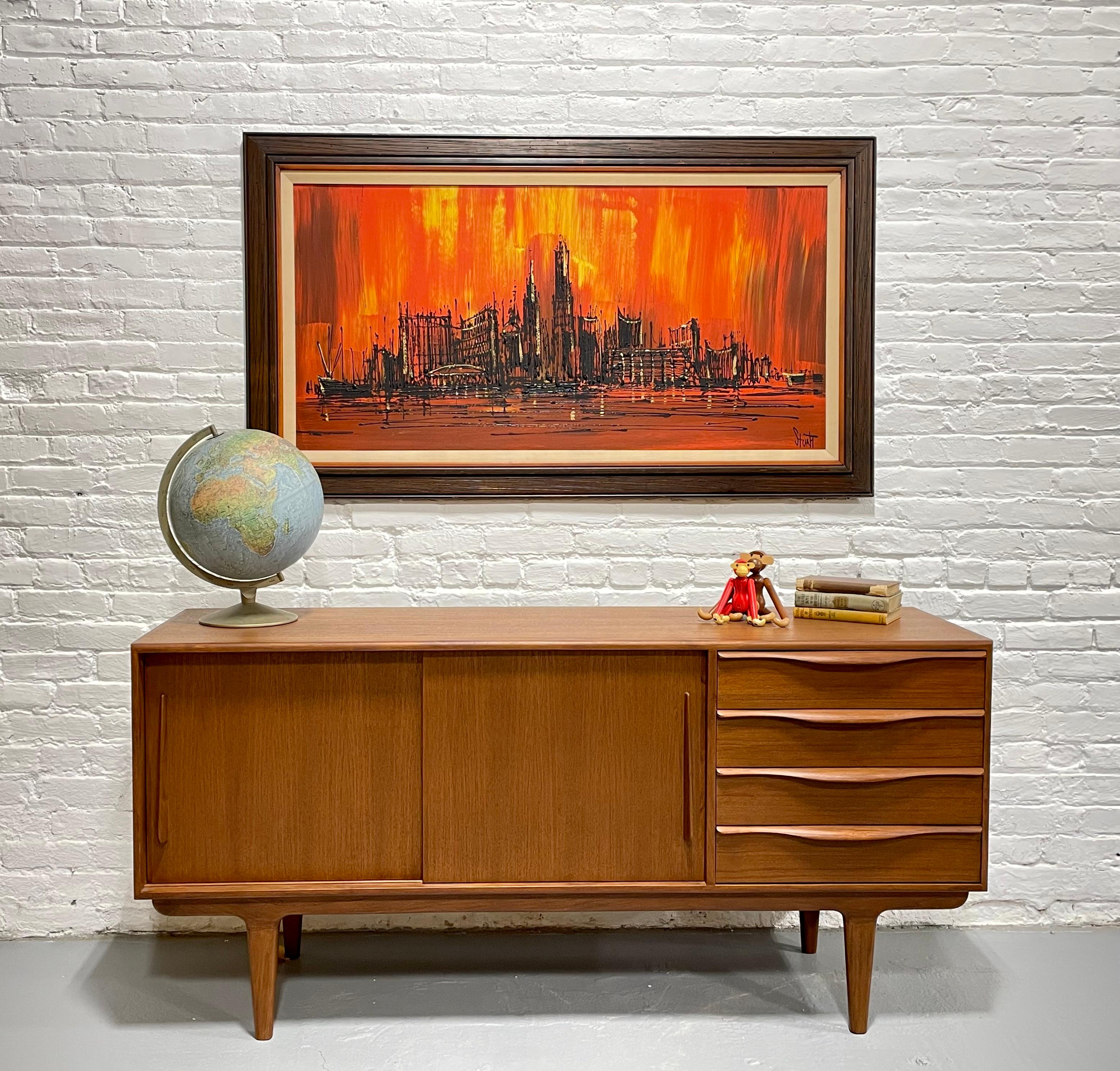 Large framed Mid Century Modern Skyline Artwork.  Acrylic on masonite with some metallic gold pigment. Vibrant orange and red. Signed Stuart lower right, with label affixed to the back, Vanguard Studios. Hanging hardware affixed to the back, ready