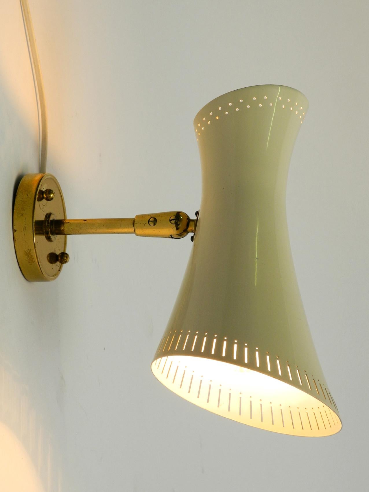 perforated metal wall sconce