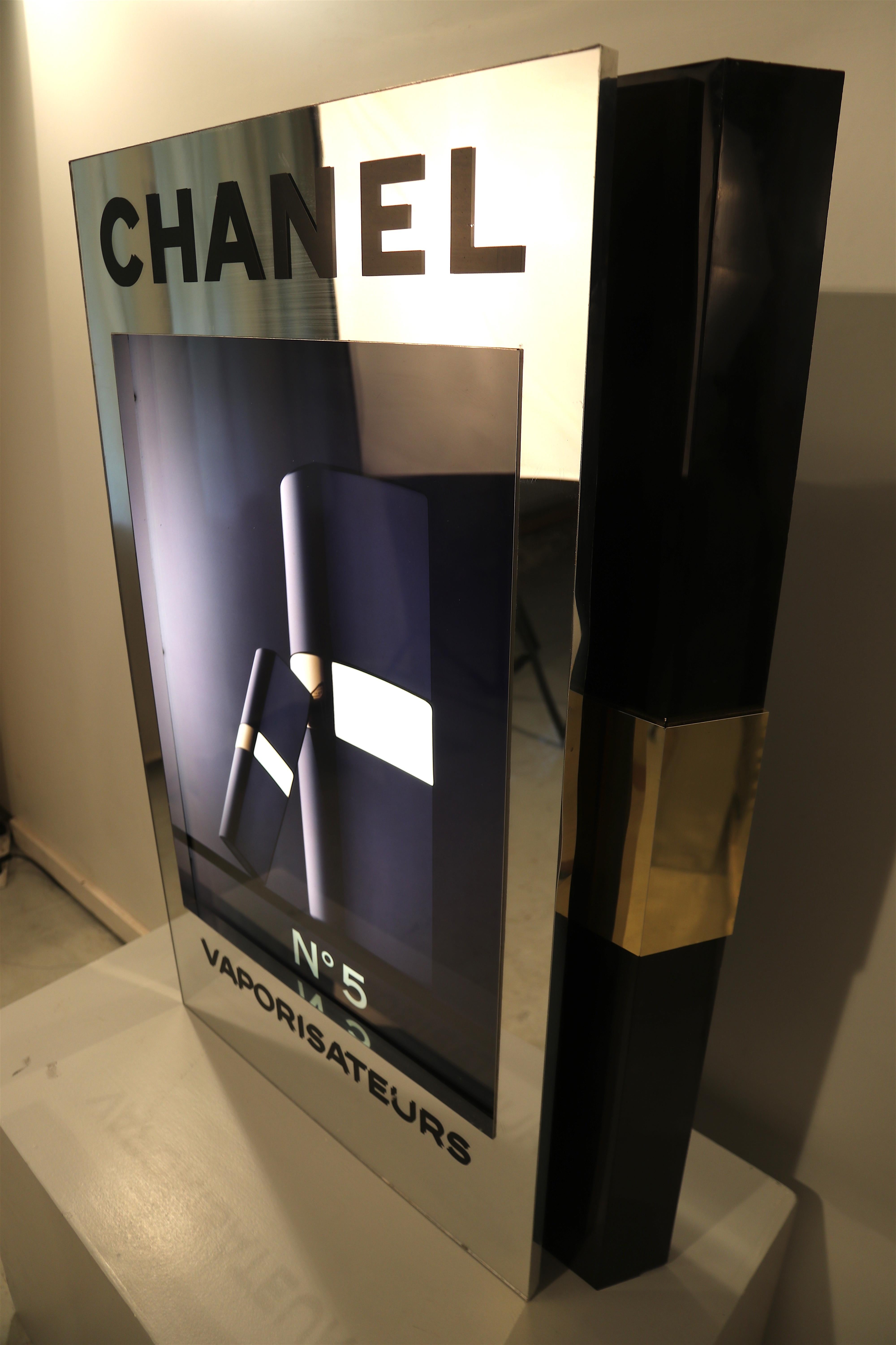 Wonderful back-lit original Chanel display formerly used in the perfume store at the business-jet only airport 