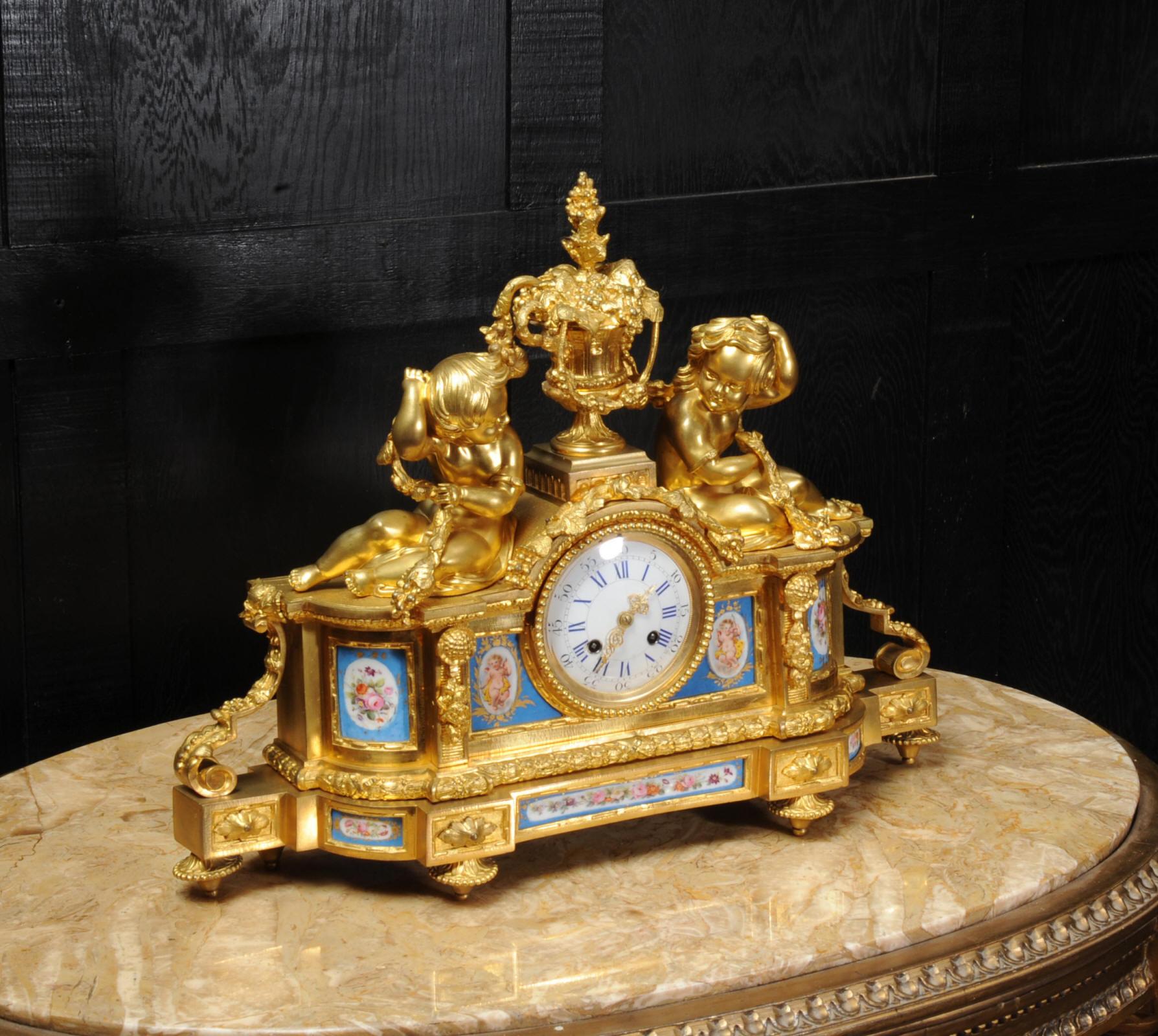 Neoclassical Large Ormolu and Sèvres Porcelain Antique French Clock, Wine Grapes Cherubs