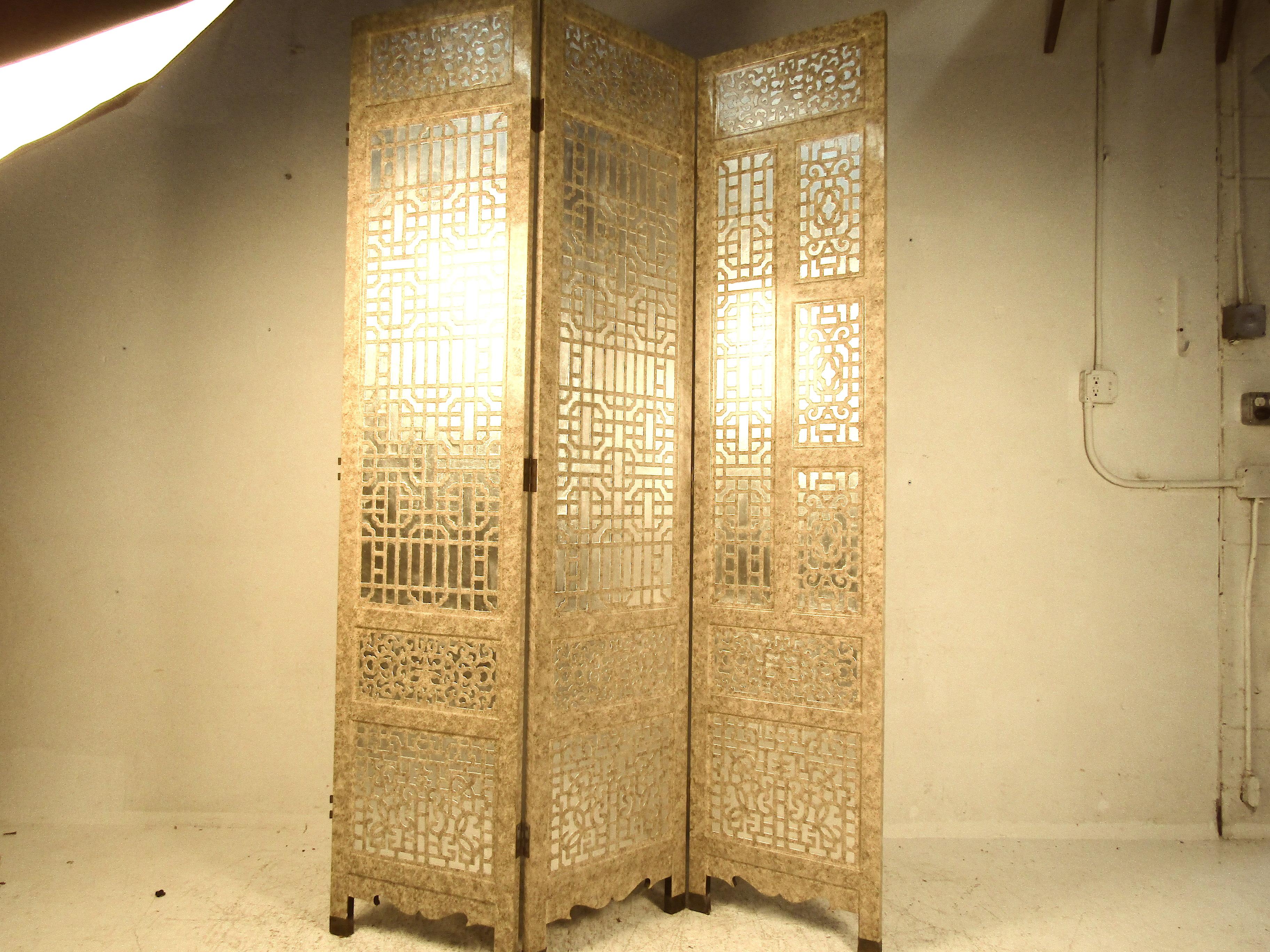 This very large ornate room divider will make a statement any place you put. Featuring a reflective finish, it catches the light and creates an element of fantasy. Perfect for creating additional space in a larger room, or blocking something from