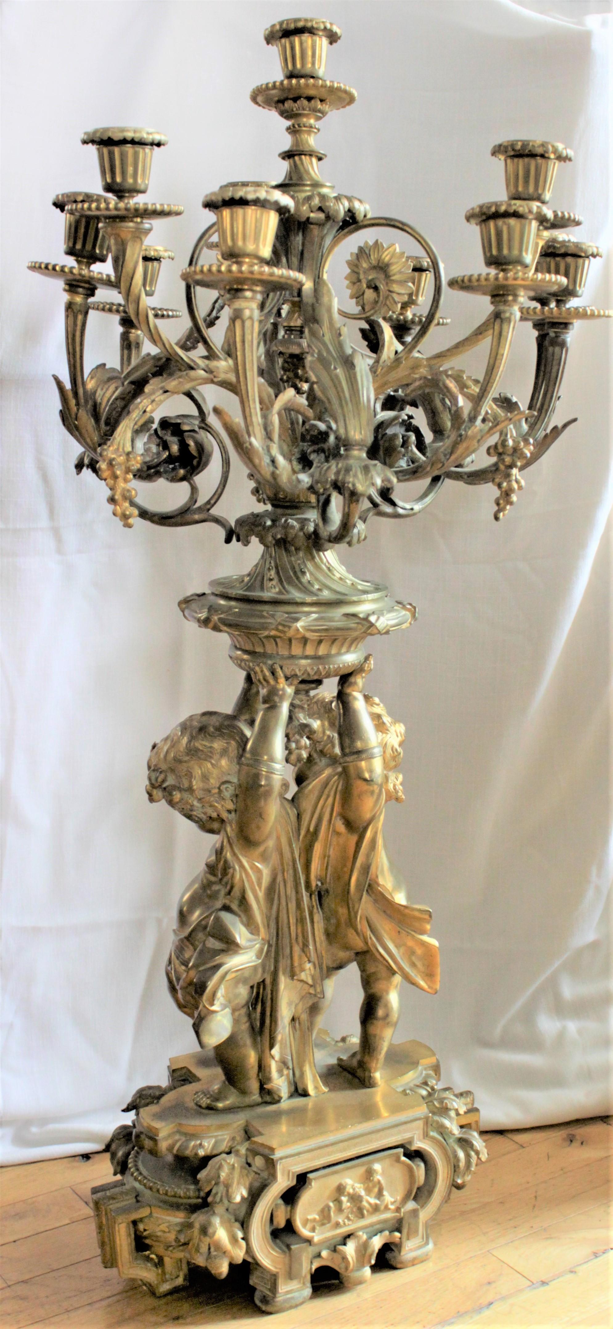 Large Ornate Antique French Solid Gilt Bronze Candelabra with Figural Base In Good Condition In Hamilton, Ontario