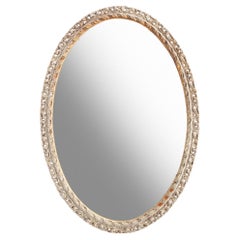 Grand miroir ovale orné, doré/peint et chantourné en bois de feuillus 