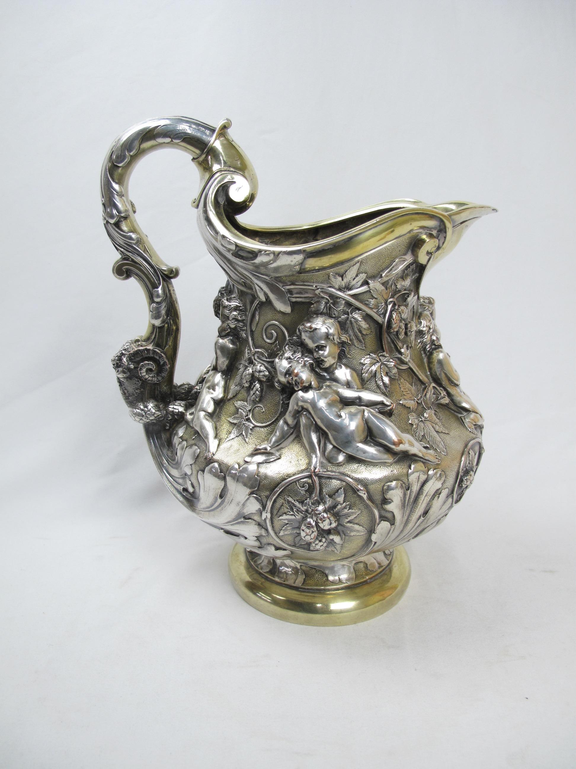 Rococo Revival Large Ornate Putti Cavorting Among Hops Repousse Pitcher Elkington 19th Century For Sale