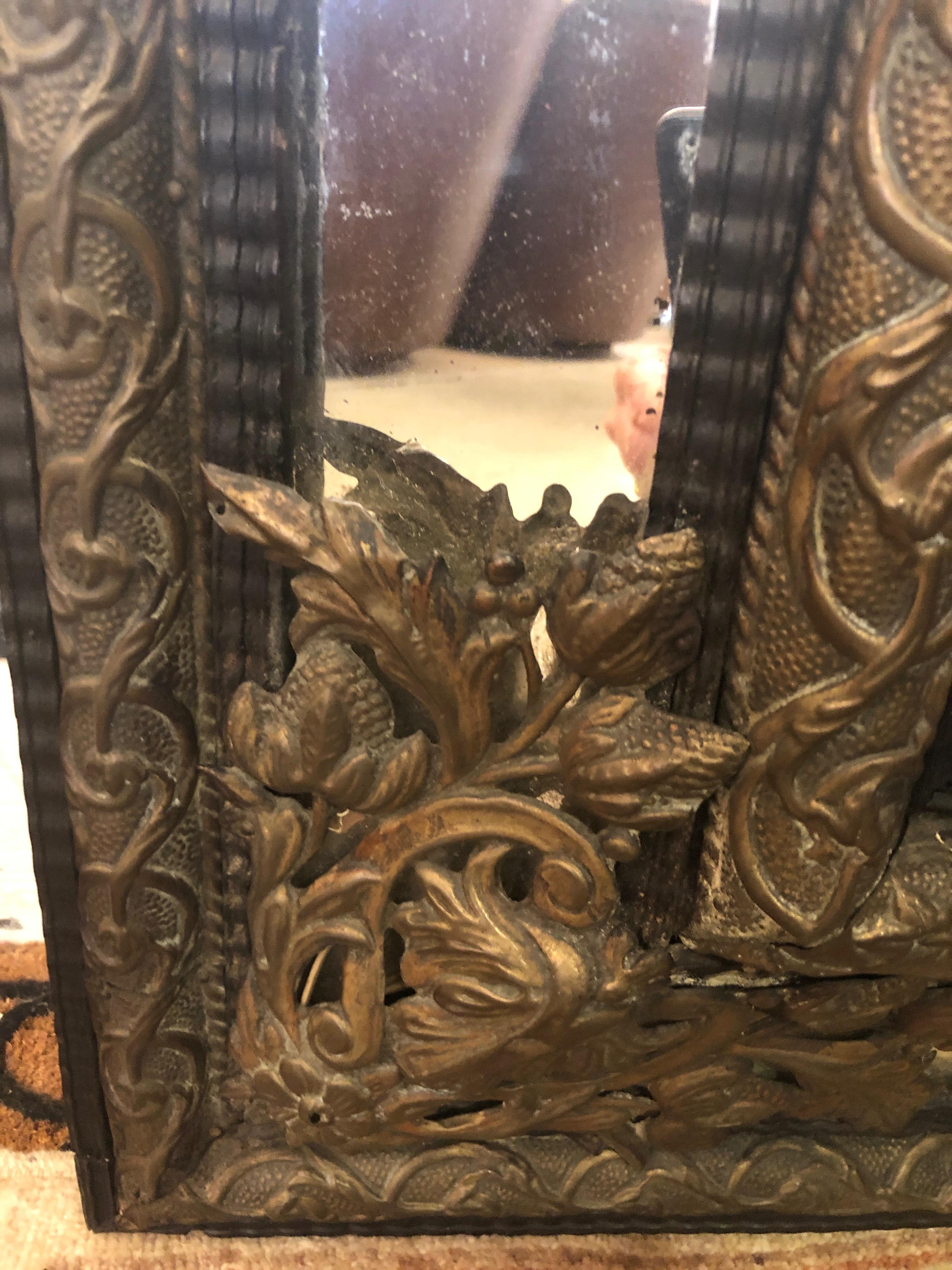 Large Ornate Repousee Brass and Ebonized Cushion Mirror 4