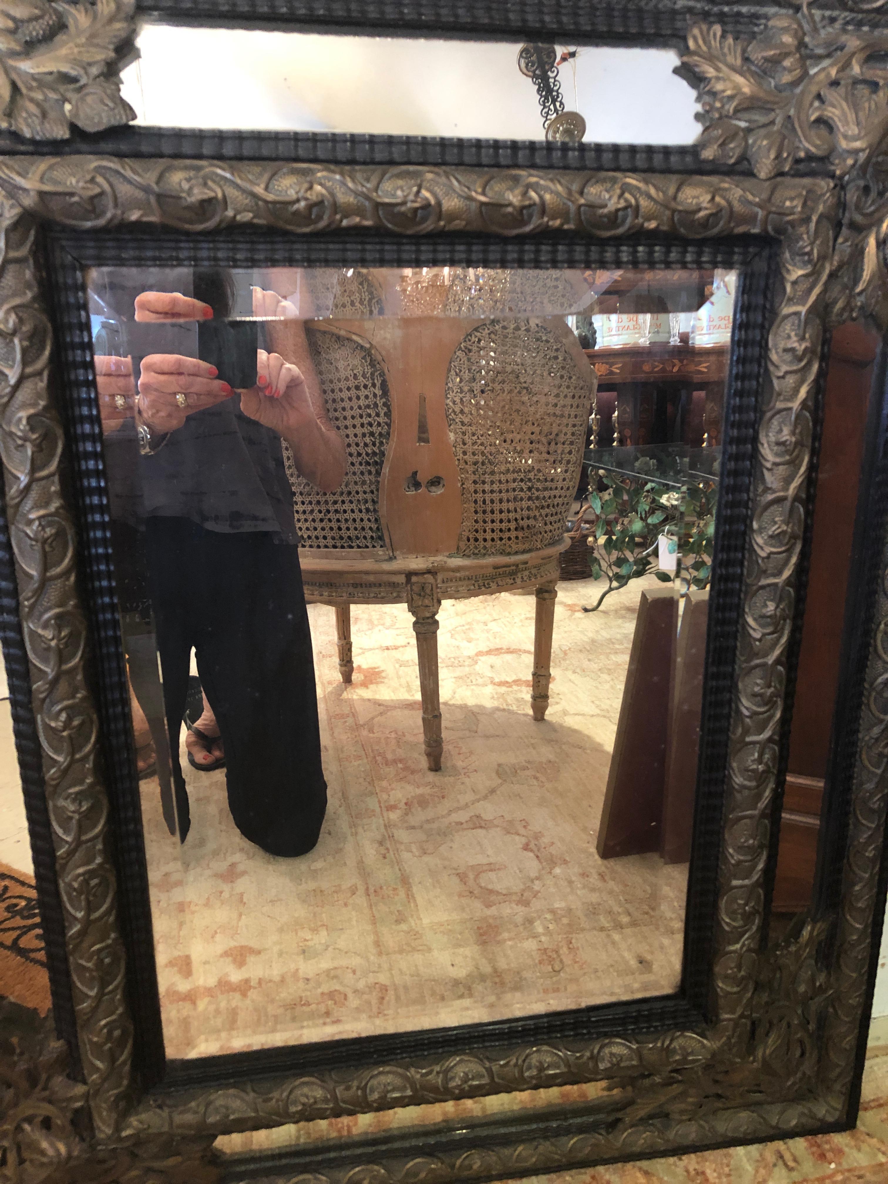 Large Ornate Repousee Brass and Ebonized Cushion Mirror 3