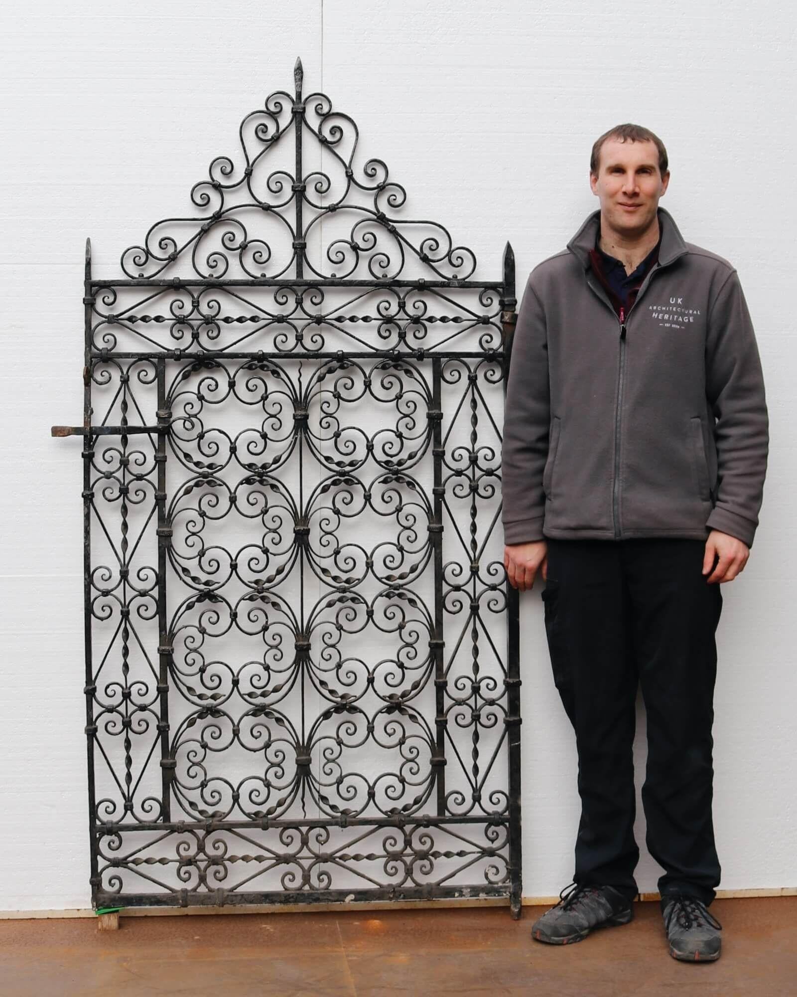 Detailed with an abundance of stylised scrolling patterns, this original 19th century Victorian side gate is a beautiful addition to any garden. Tall and wide, it brings security as well as style to gardens, courtyard and backyards, creating a