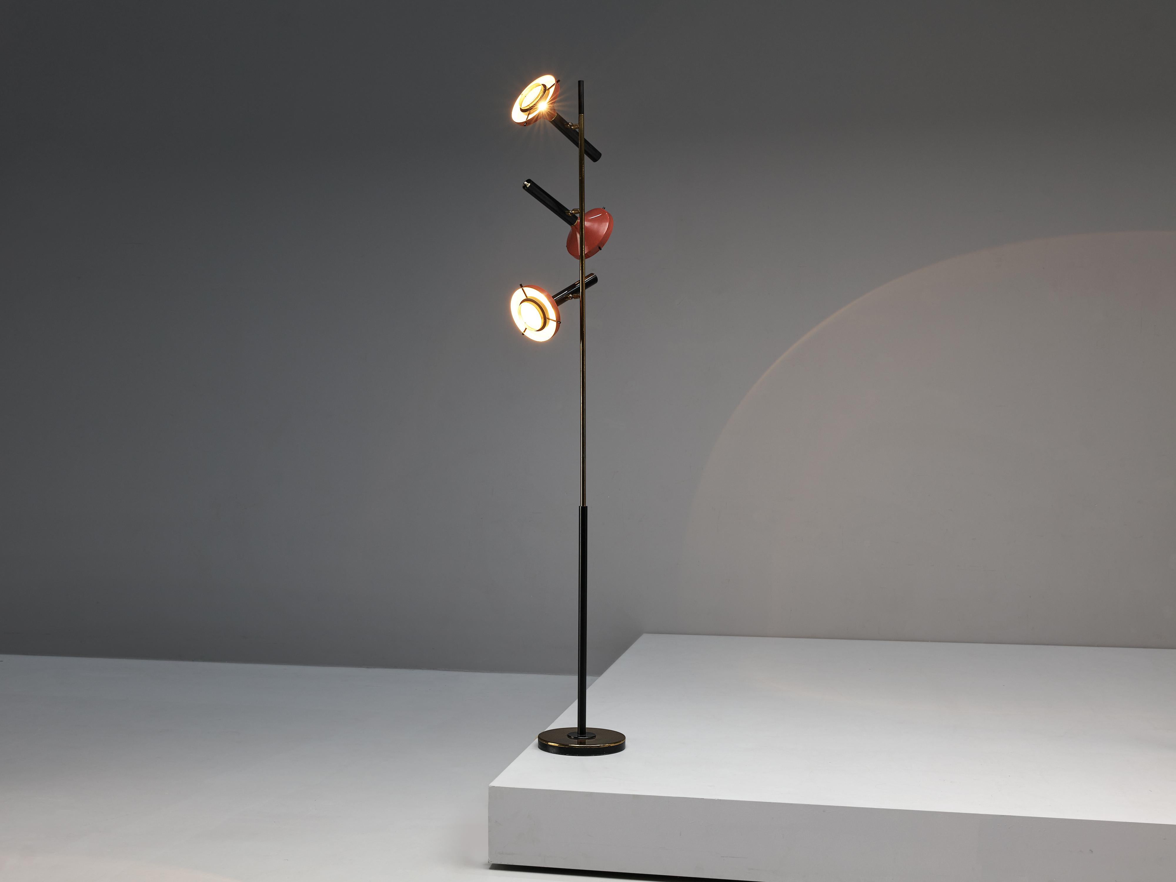 Oscar Torlasco for Lumi, floor lamp, cast iron, brass, aluminum, glass, Italy, circa 1958

Refined floor lamp with three black and red shades designed by the Italian designer Oscar Torlasco (1934-2004). The lamp consists of a round base from which