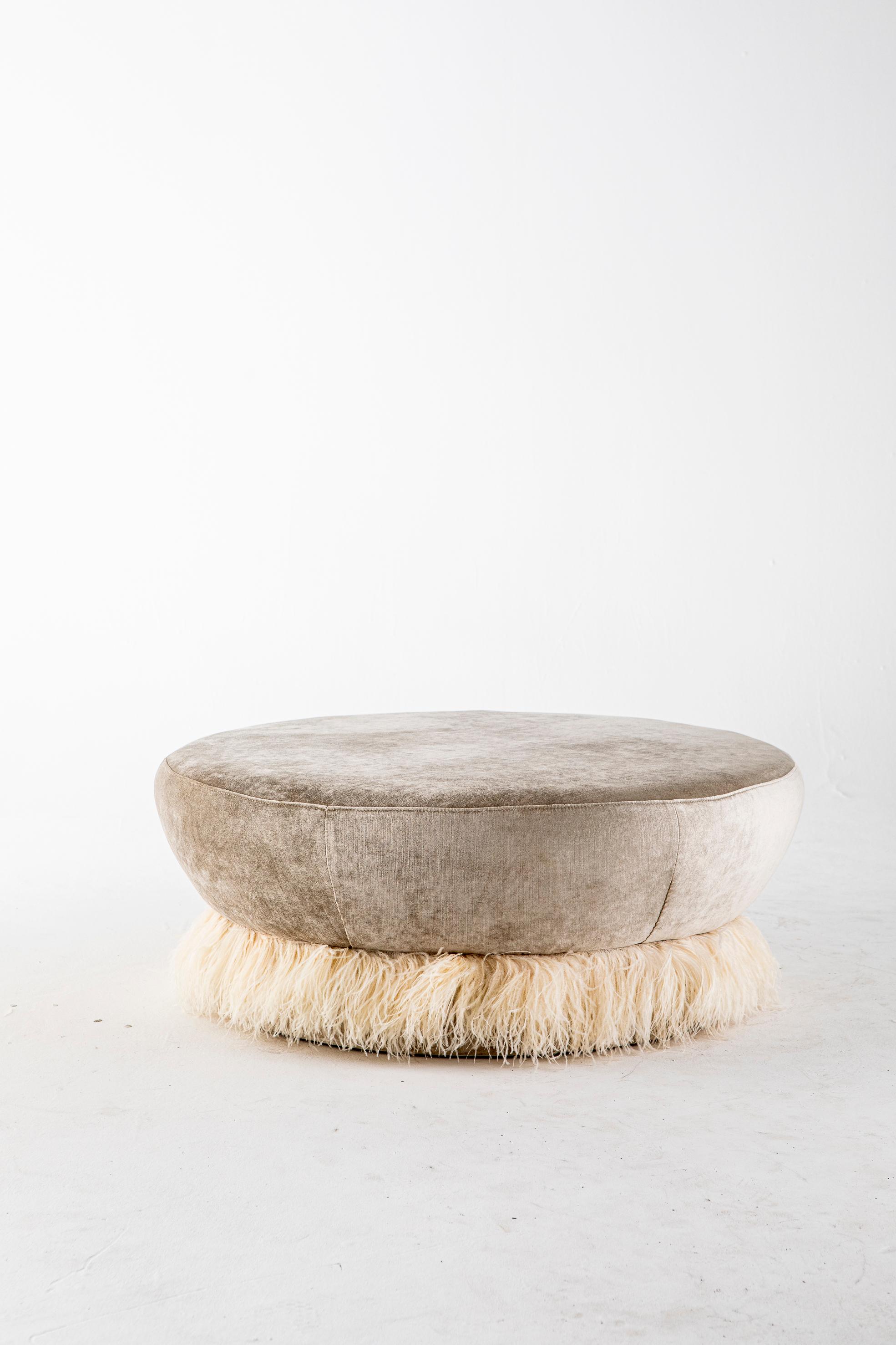 Large ostrich fluff ottoman by Egg Designs
Dimensions: 100 L x 100 D x 40 H cm
Materials: Ostrich feather trim, velvet upholstery

Founded by South Africans and life partners, Greg and Roche Dry - Egg is a unique perspective in contemporary