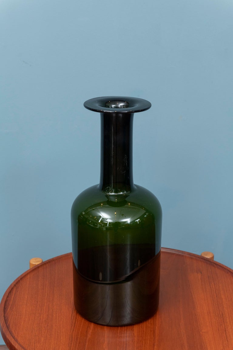 Large Otto Brauer design Gulvase for Holmgaard, Denmark. Impressive example in a rare size in beautiful sea green color glass with his signature shape that would be perfect for flowers on a center table or floor vase.